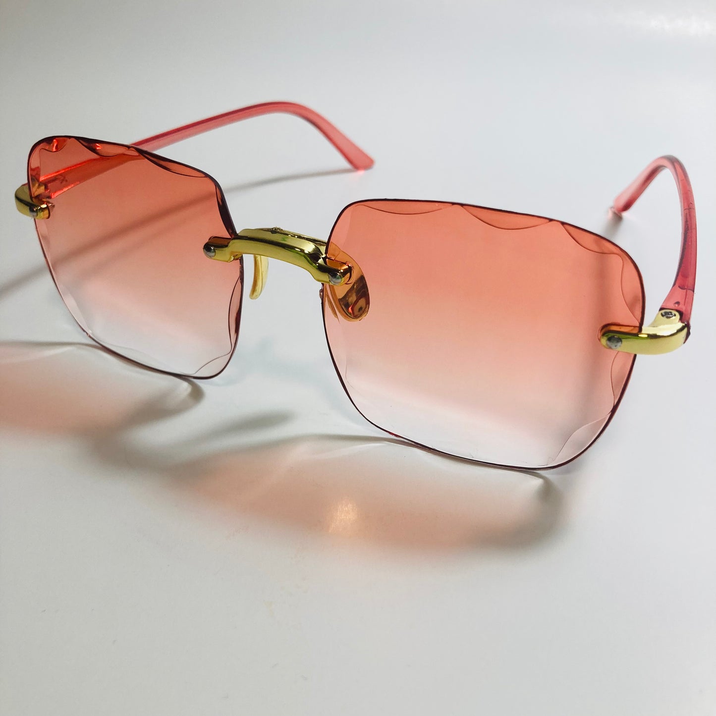 womens rimless gold square oversize sunglasses with red lenses