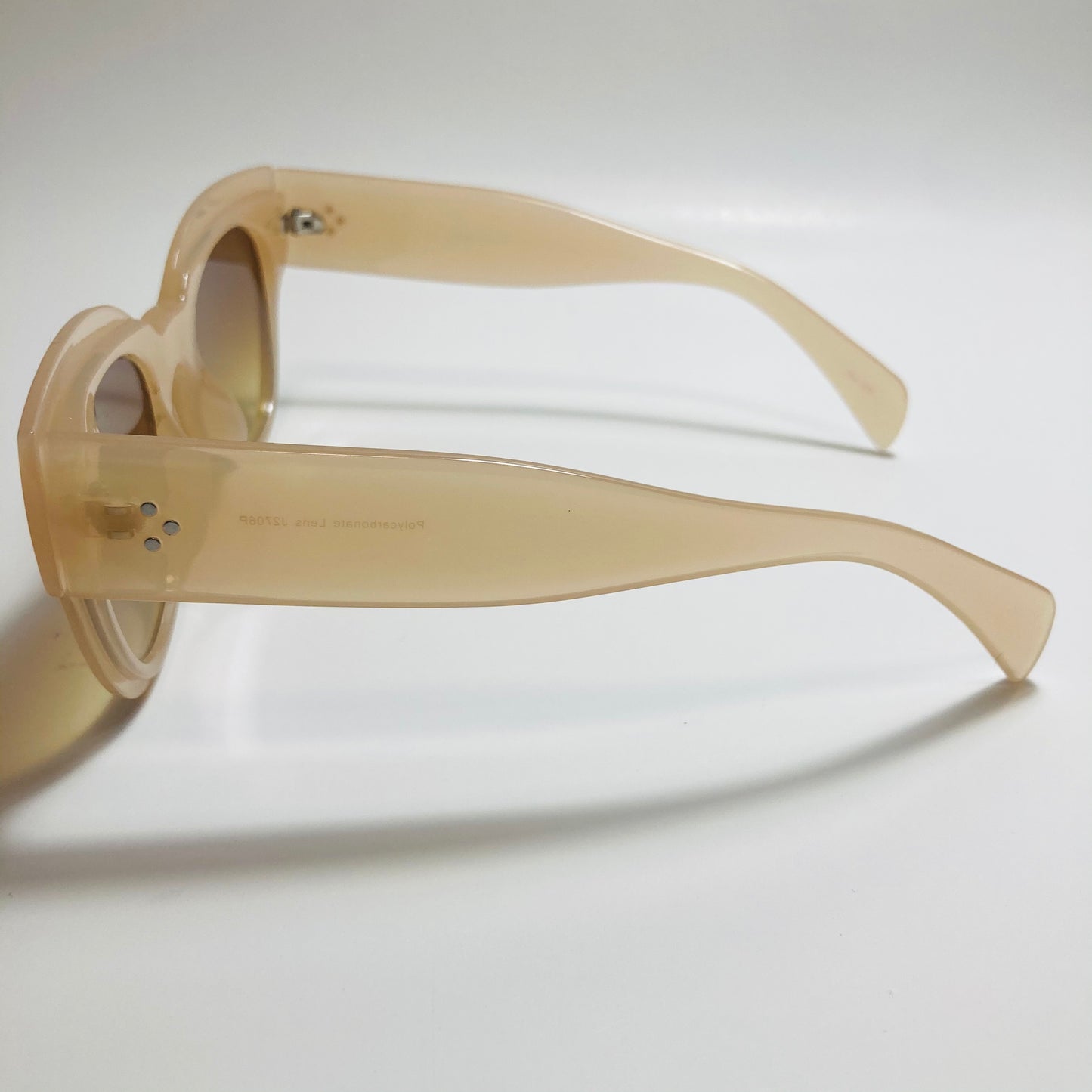 tan and brown womens round oversize sunglasses