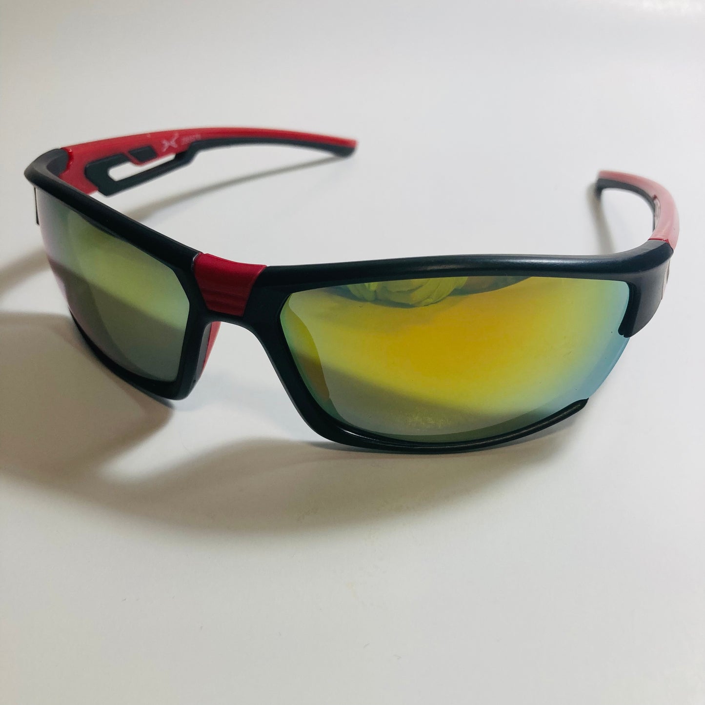black, red, and yellow wrap around sunglasses