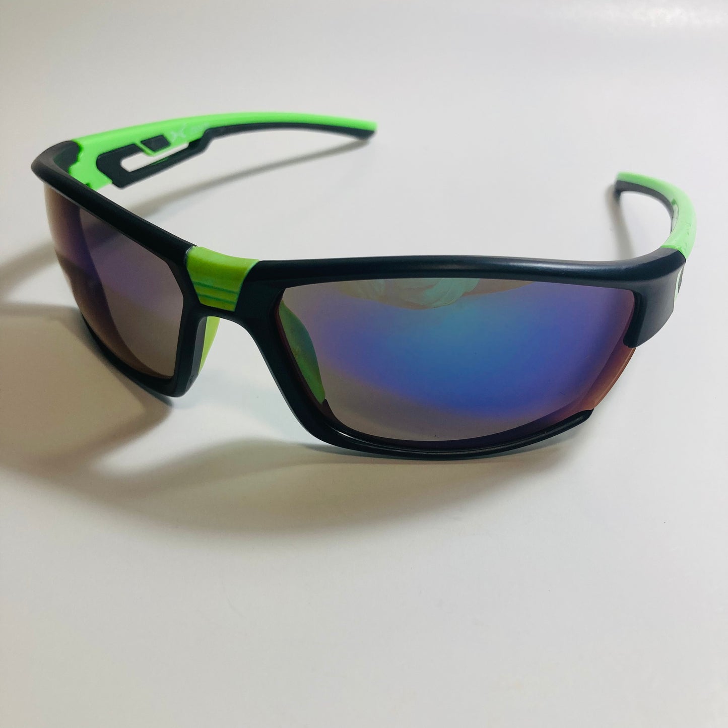 black, green, and blue wrap around sunglasses