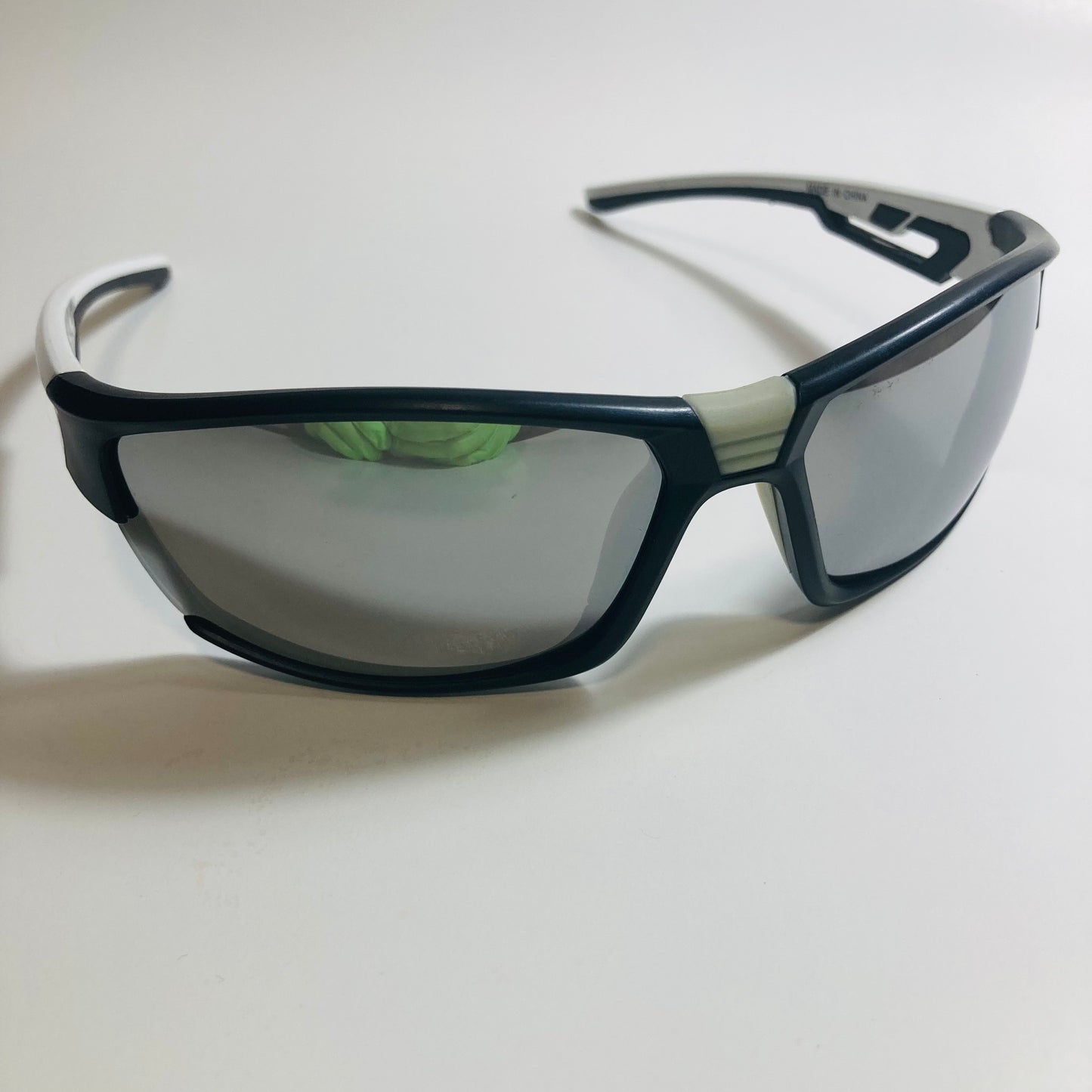 black and silver wrap around sunglasses