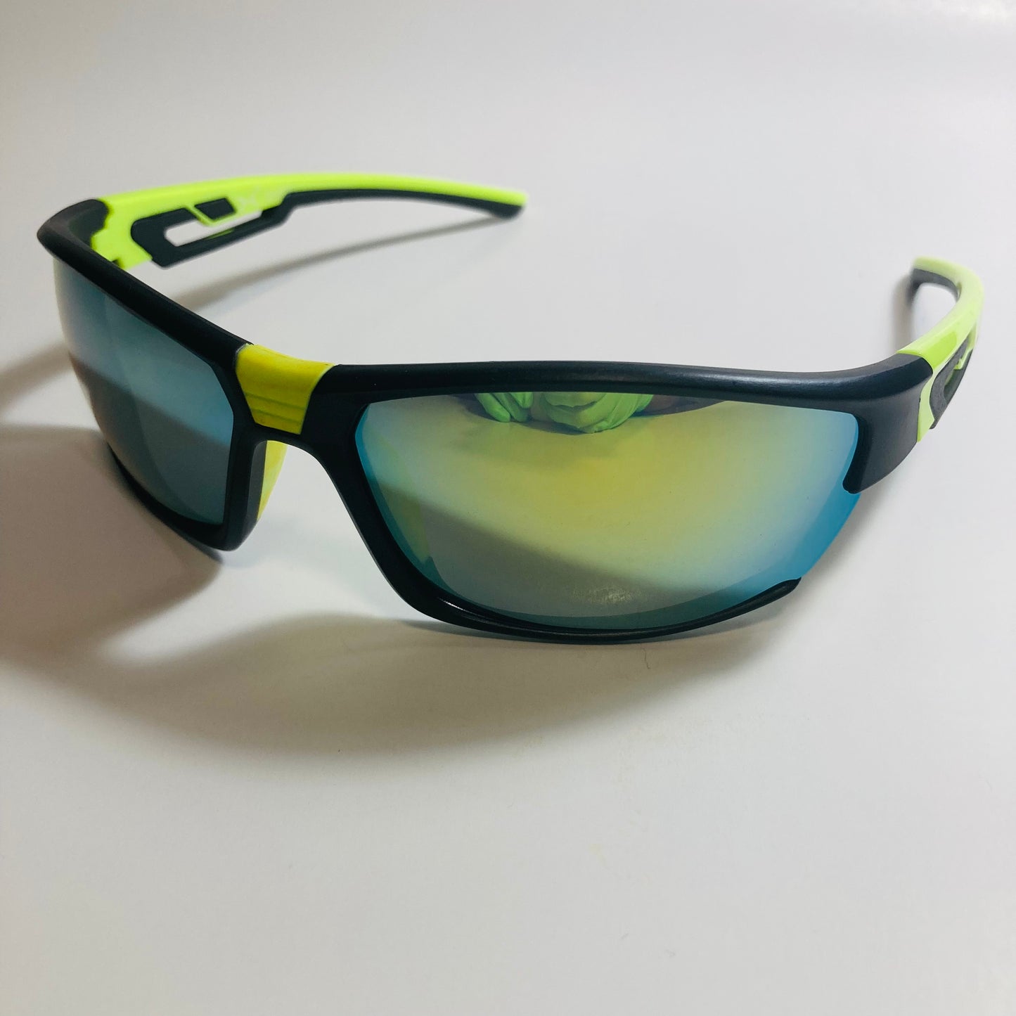 black, green, and yellow wrap around sunglasses