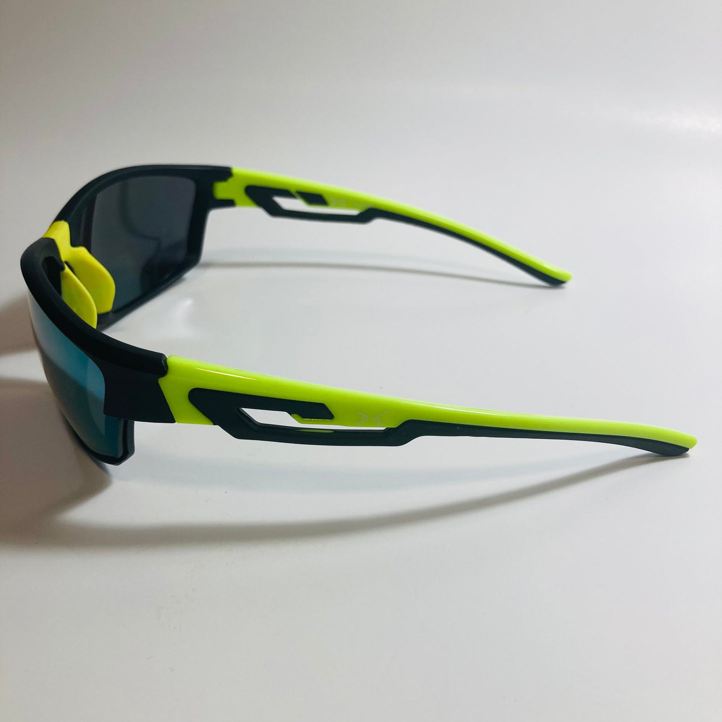 black, green, and yellow wrap around sunglasses
