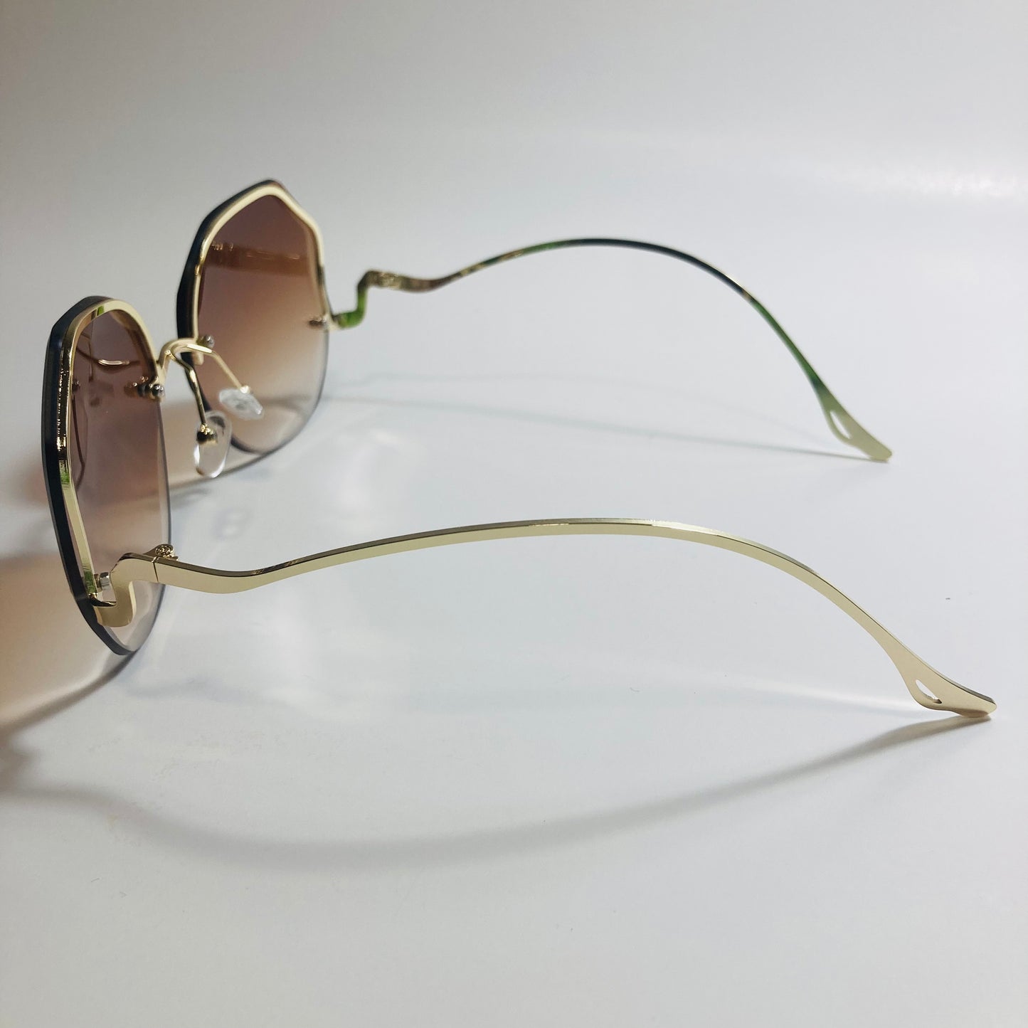 womens brown and gold rimless sunglasses