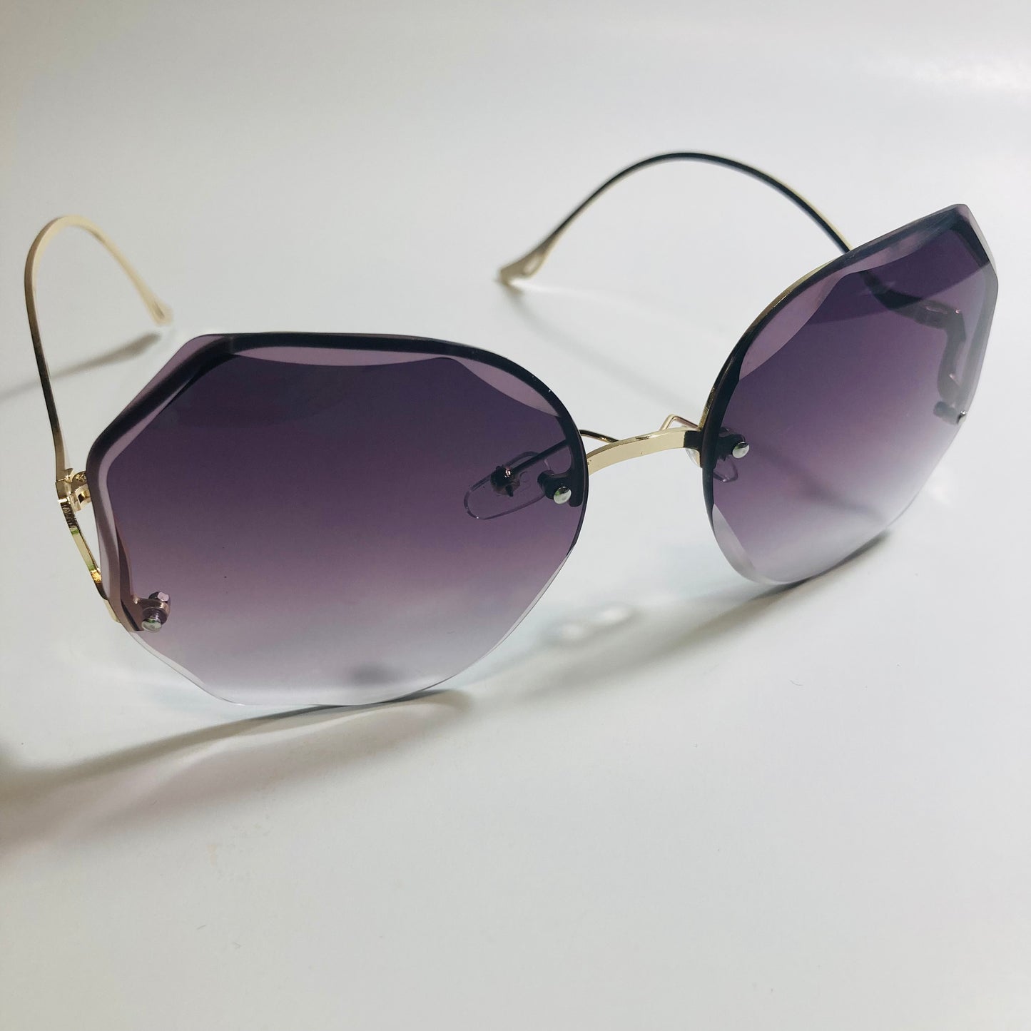 womens black and gold rimless sunglasses