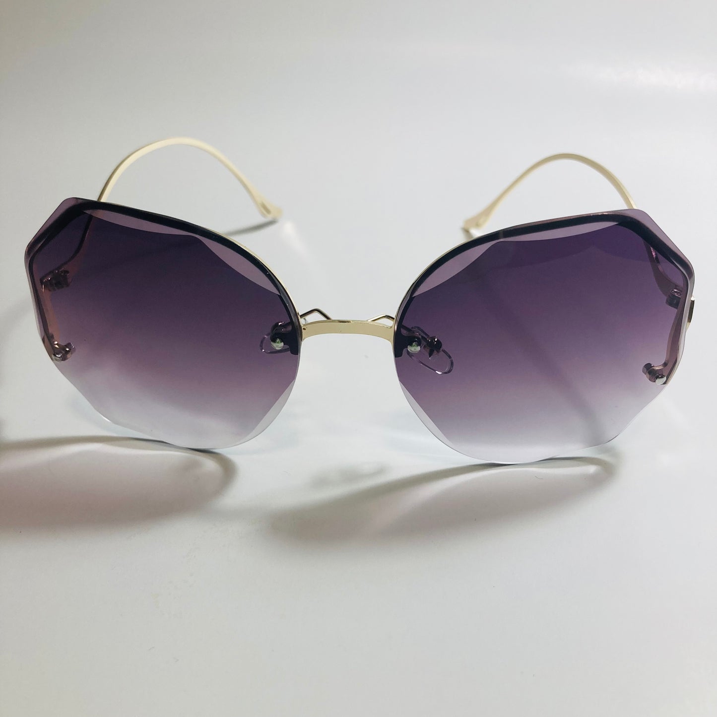 womens black and gold rimless sunglasses