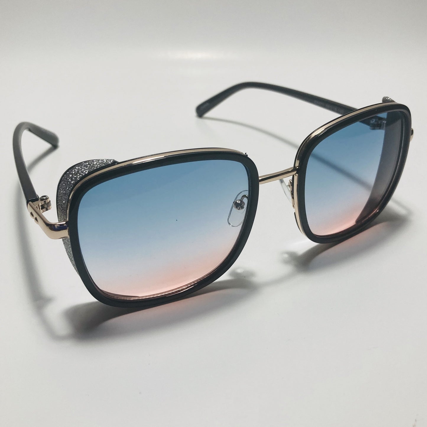 pink and blue elton john sunglasses