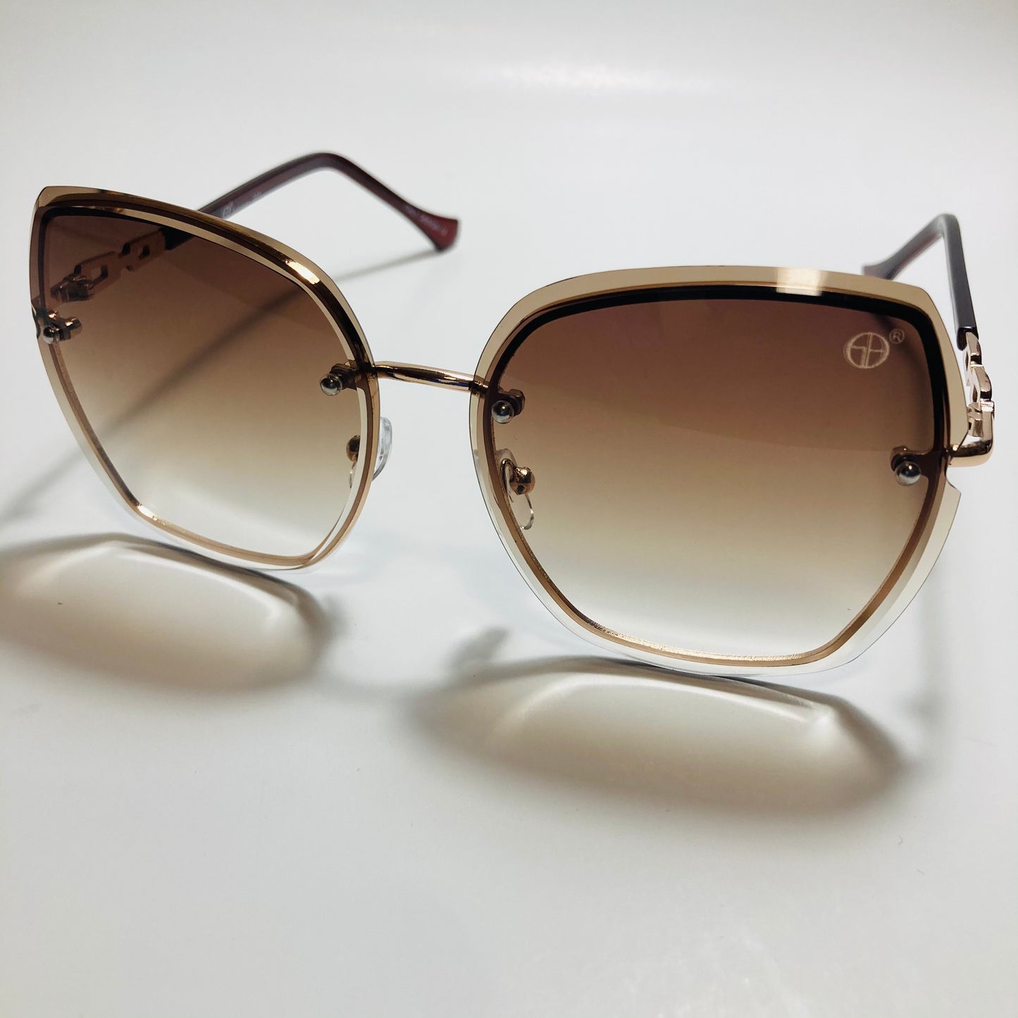 womens brown rimless oversize sunglasses
