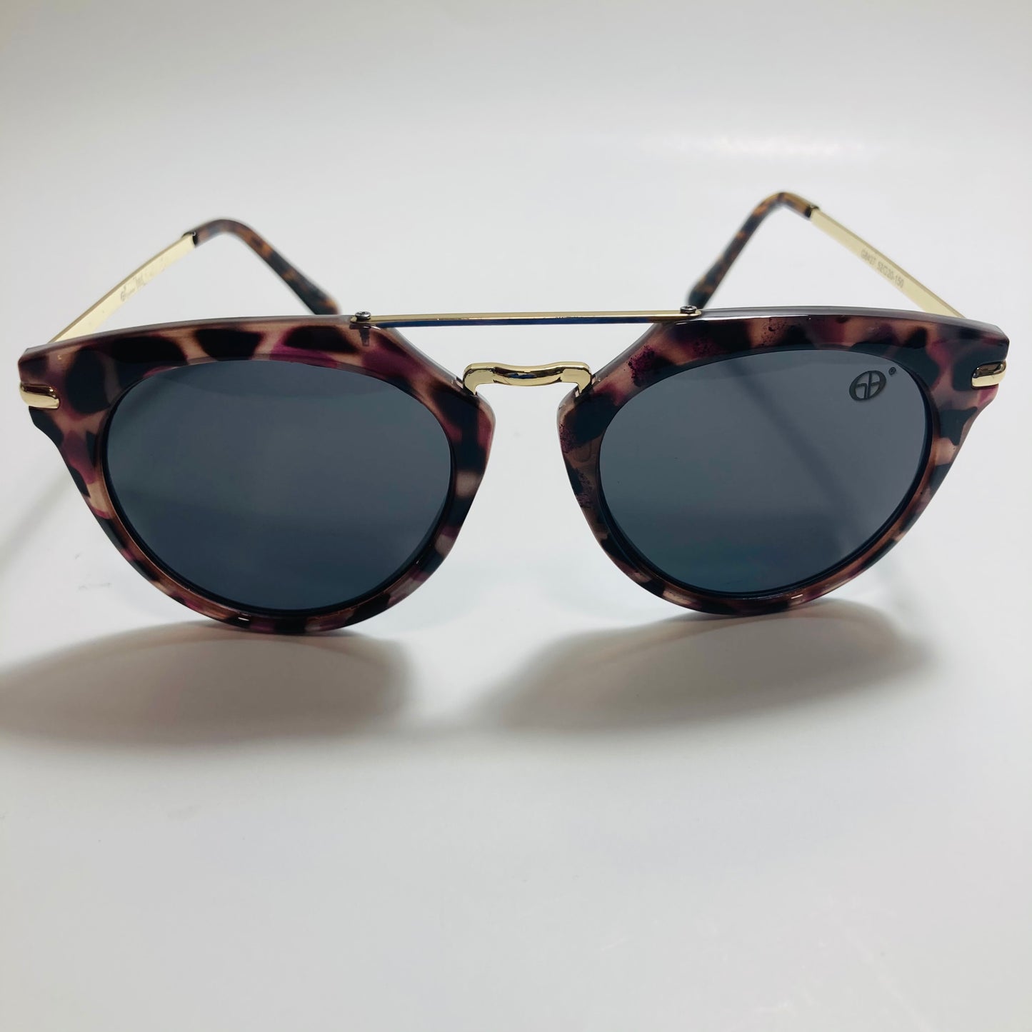mens and womens black gold and brown mirrored round sunglasses with crossbar