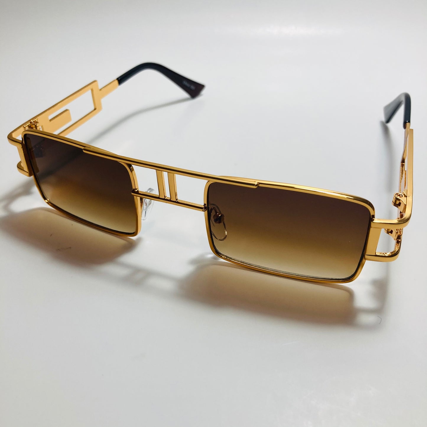 mens and womens brown and gold square sunglasses