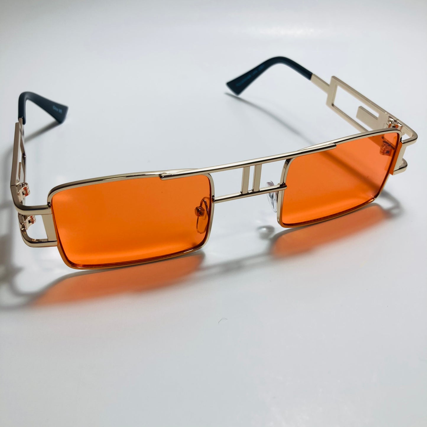 mens and womens red and gold square sunglasses
