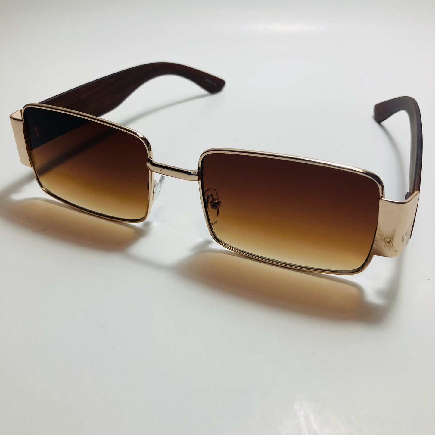 mens and womens brown and gold square sunglasses