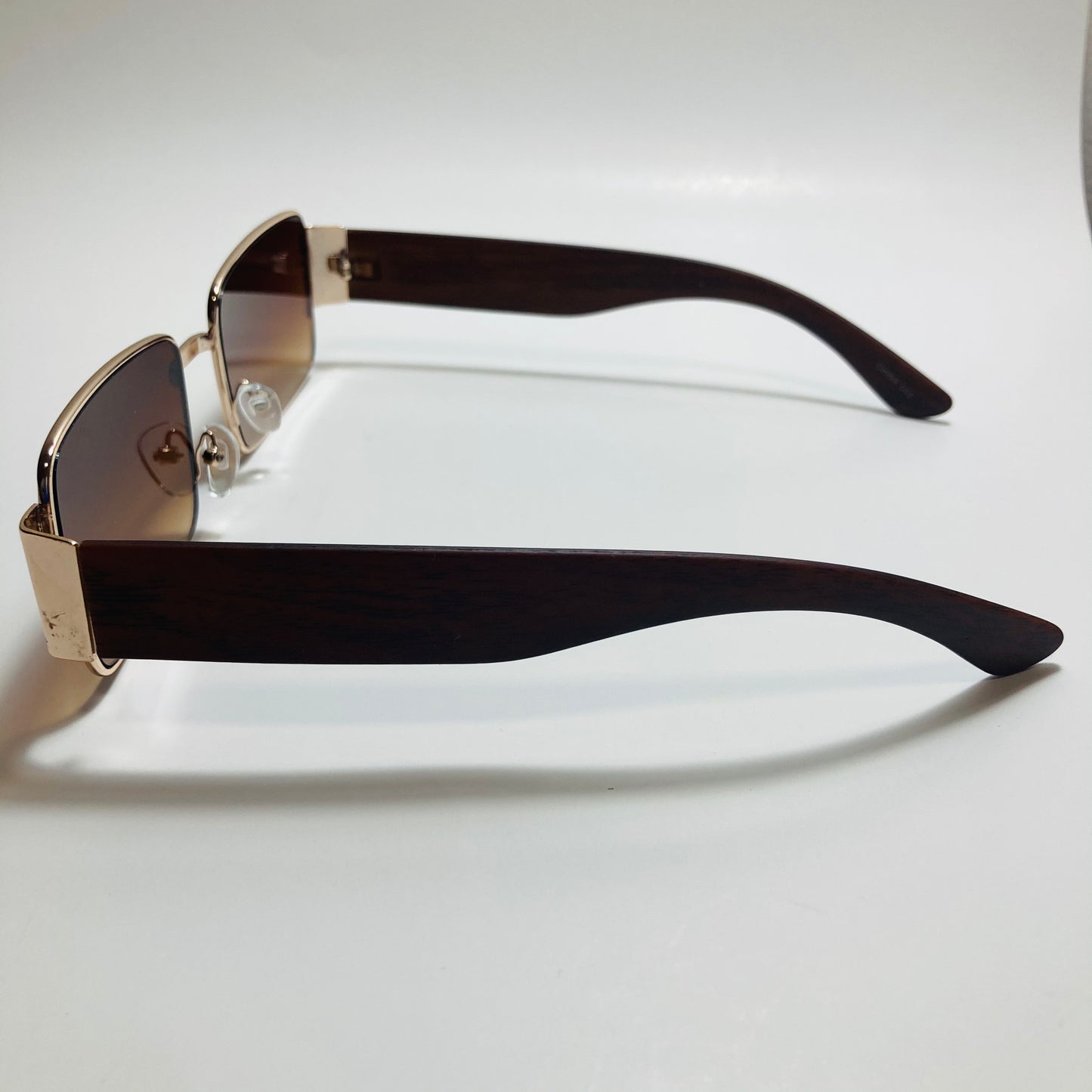 mens and womens brown and gold square sunglasses