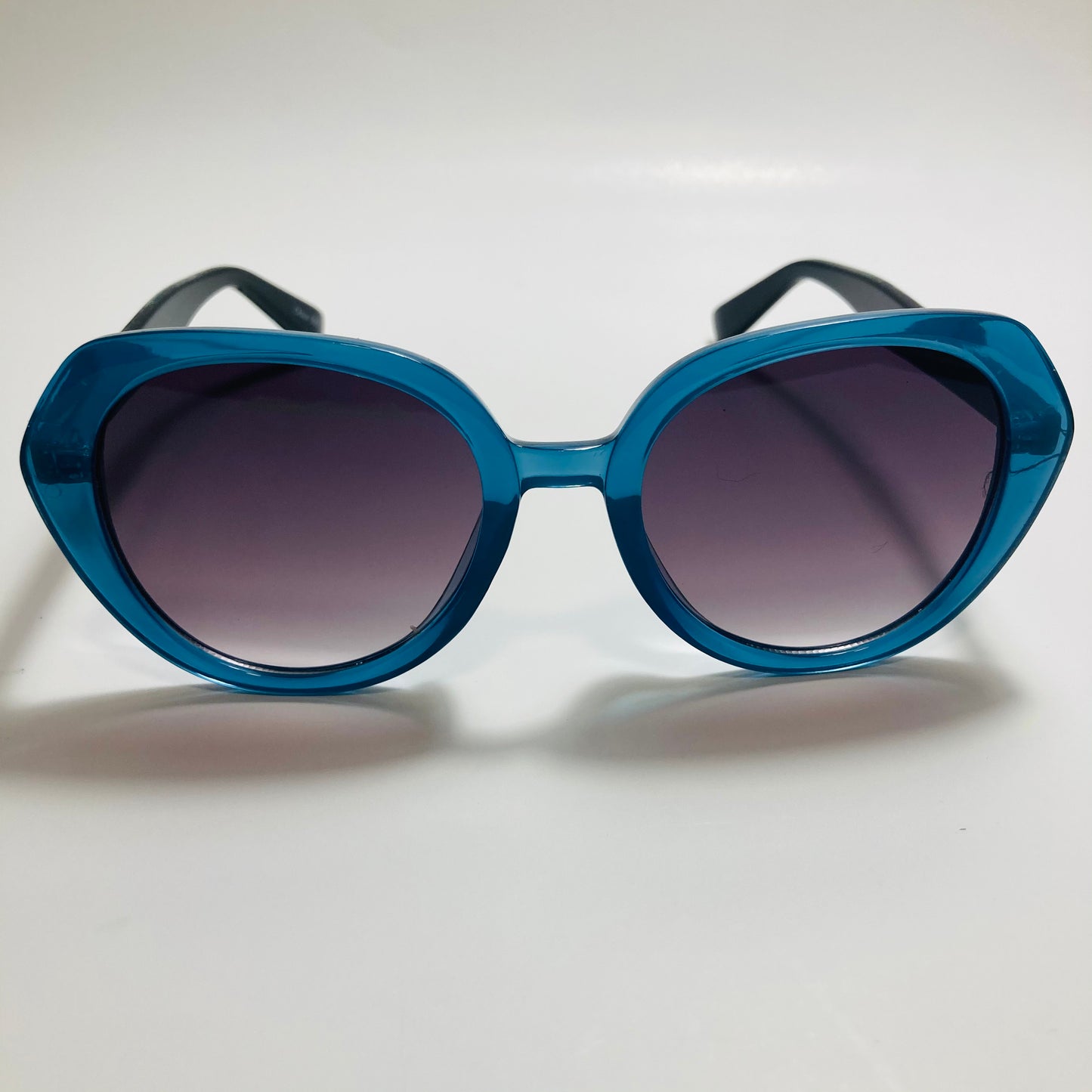 womens black and blue round glitter sunglasses