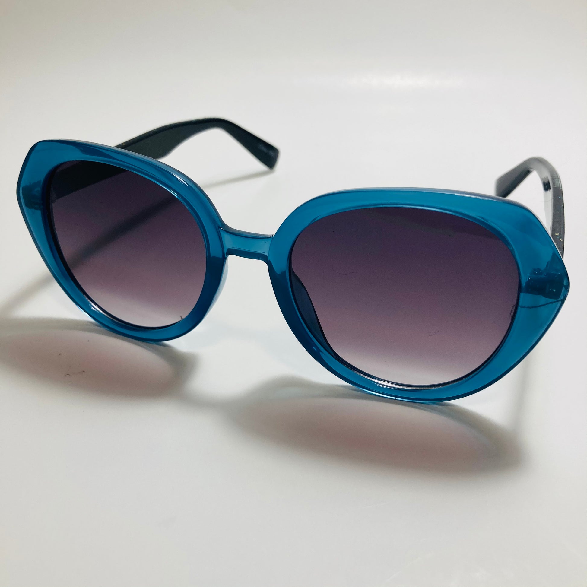 womens black and blue round glitter sunglasses