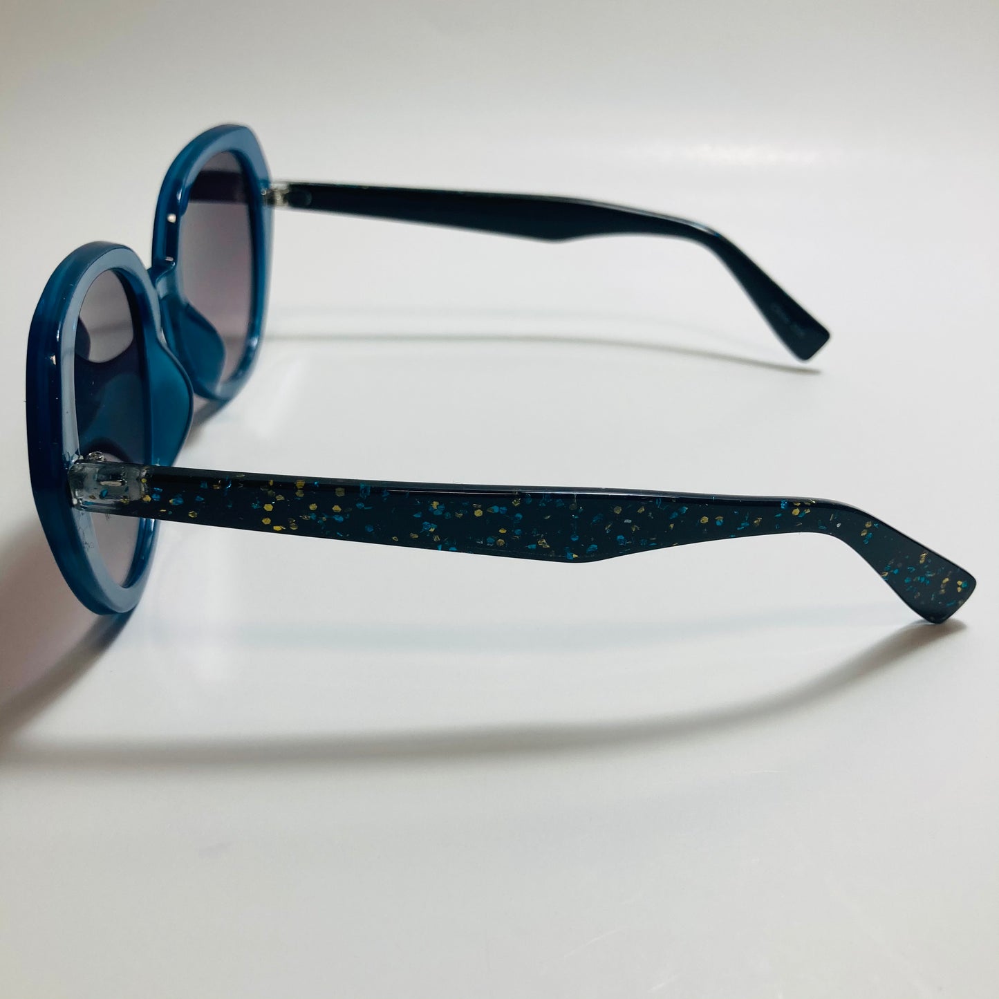 womens black and blue round glitter sunglasses