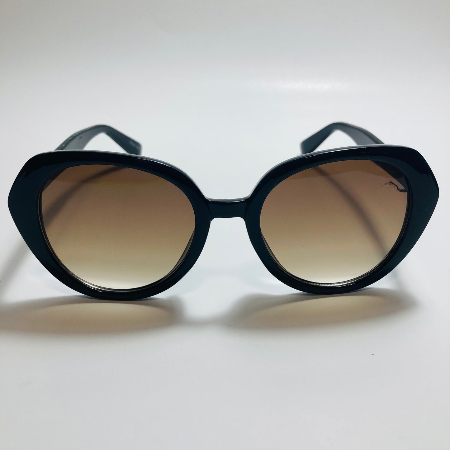 womens black and brown round glitter sunglasses