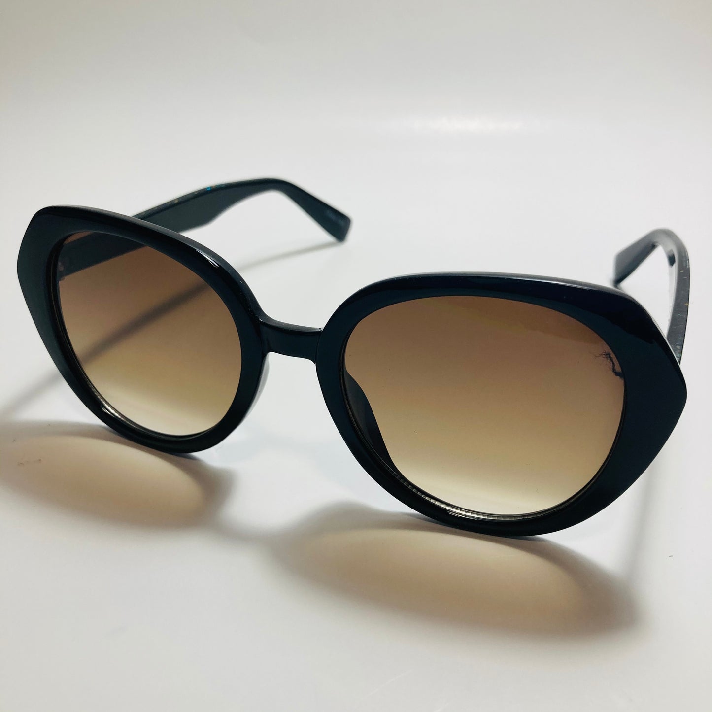 womens black and brown round glitter sunglasses