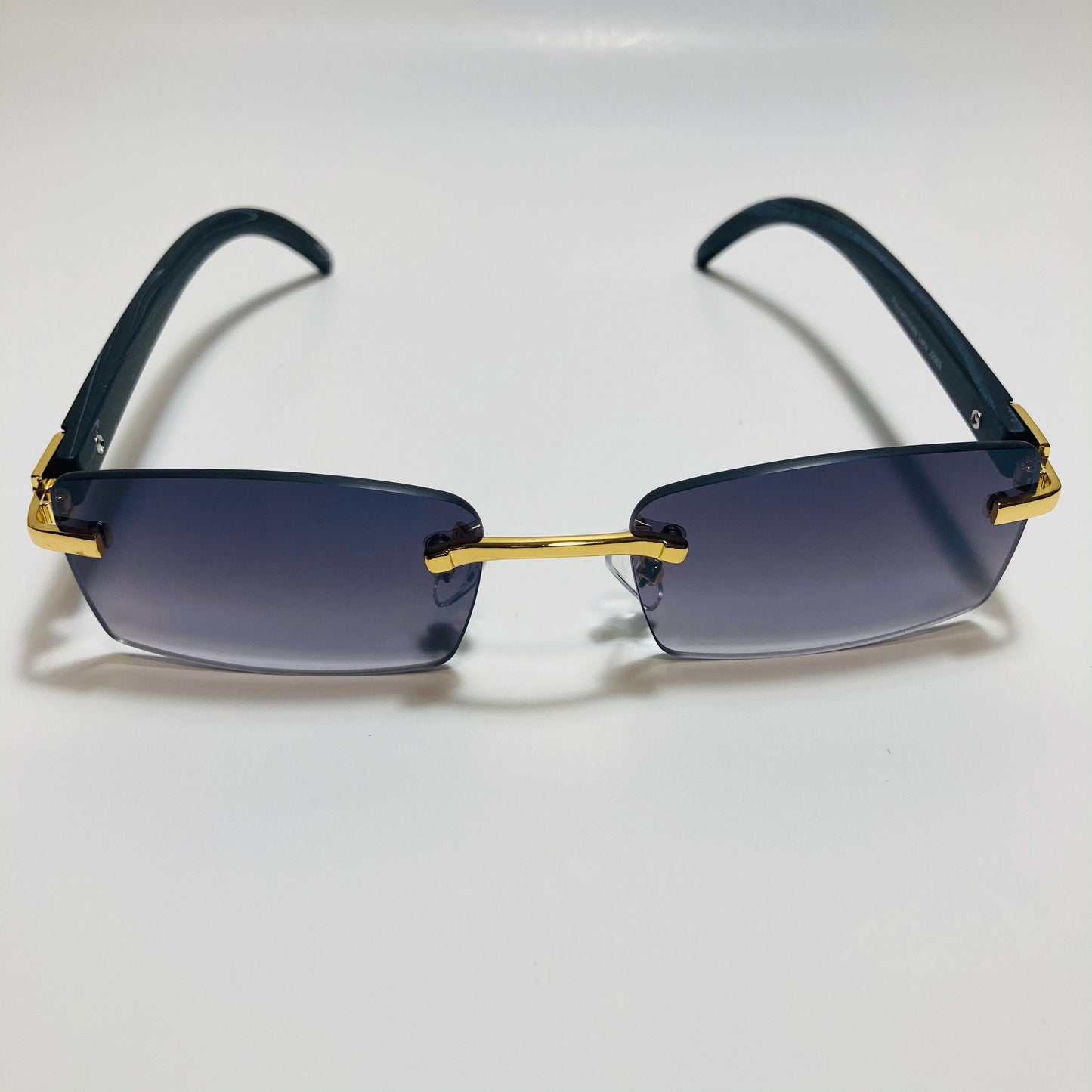 mens and womens black and gold rimless square sunglasses