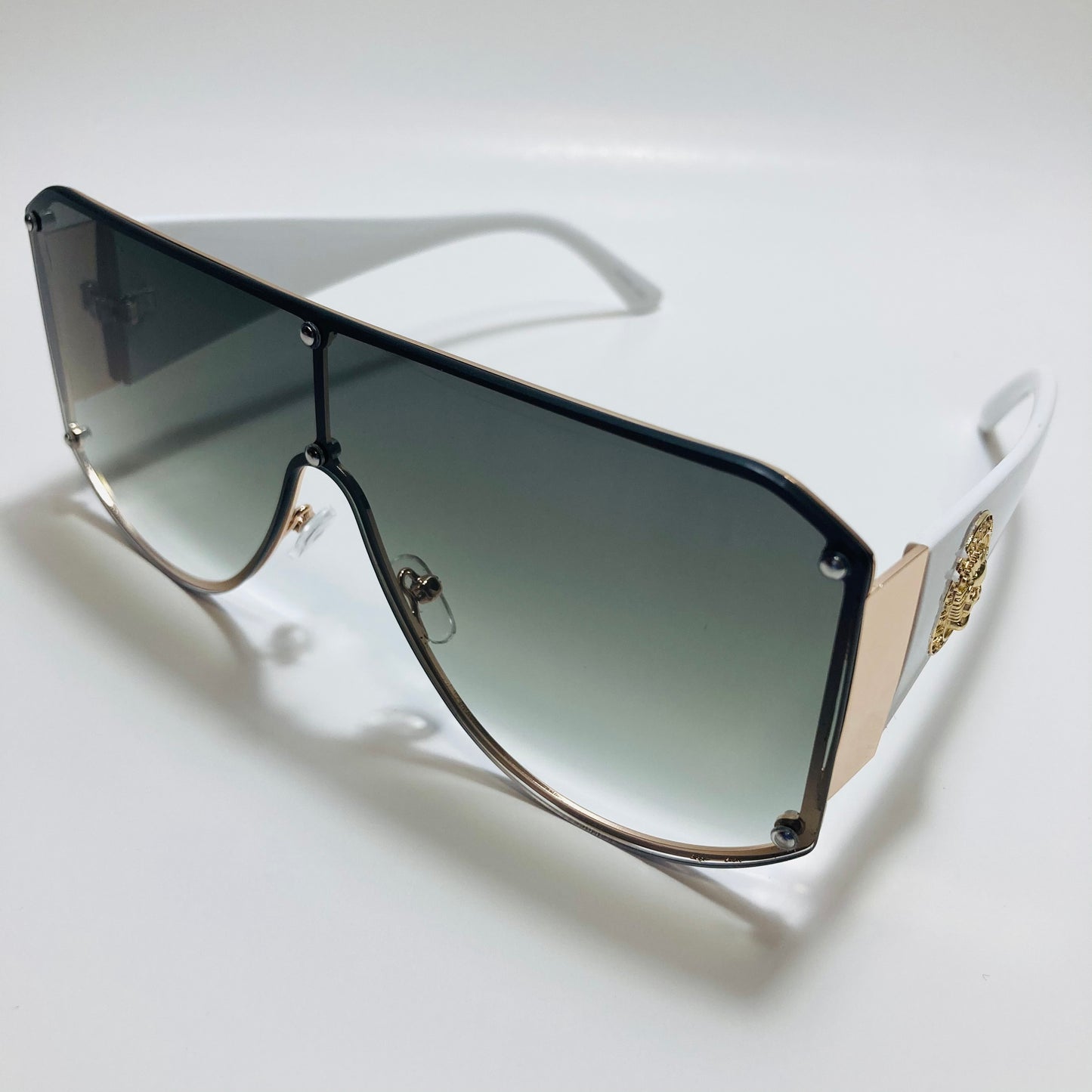white green and gold shield sunglasses