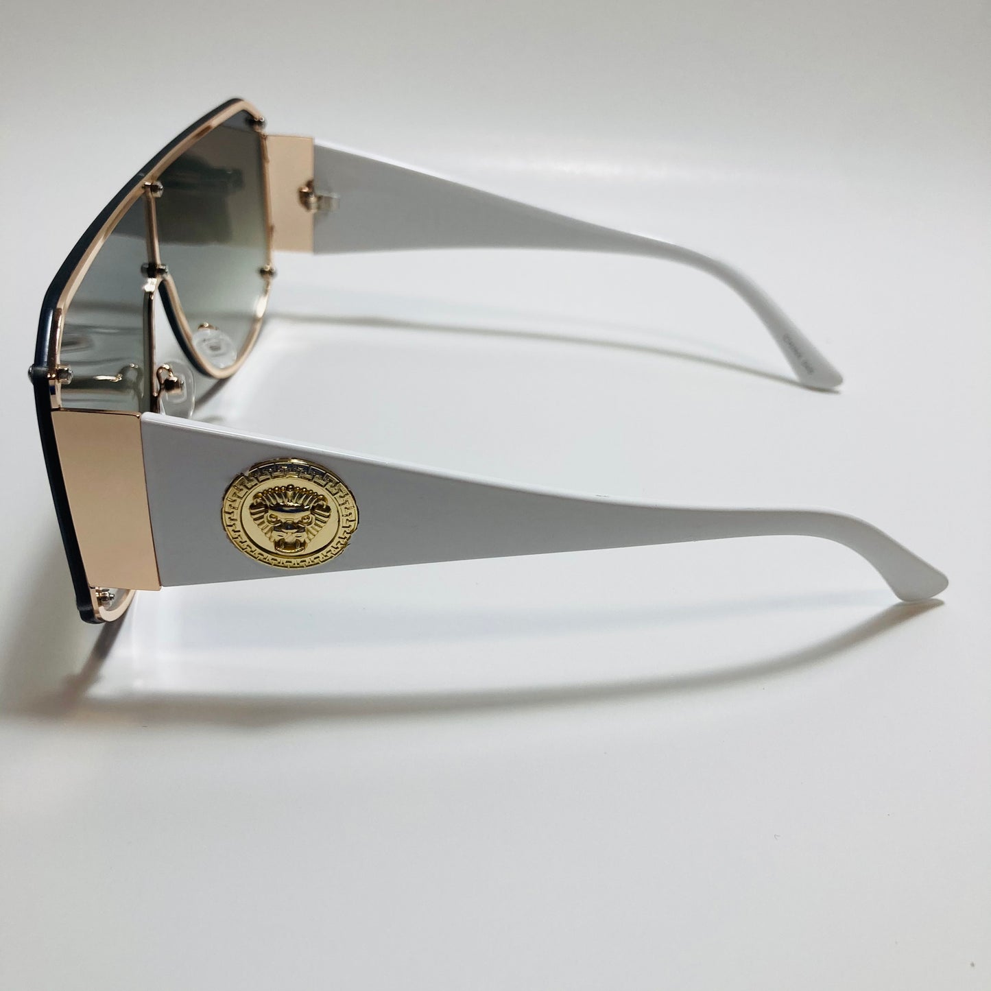 white green and gold shield sunglasses
