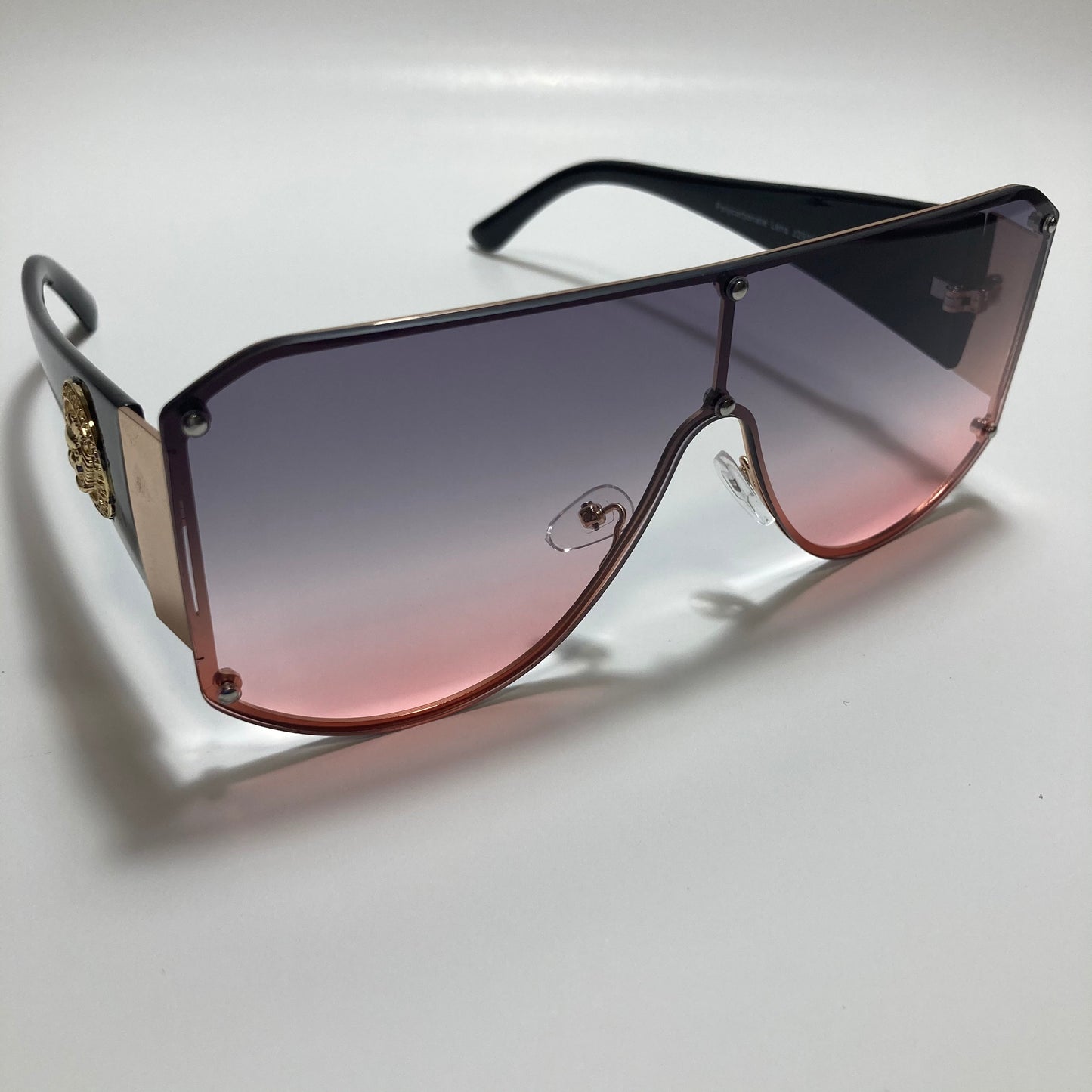 purple pink and gold shield sunglasses