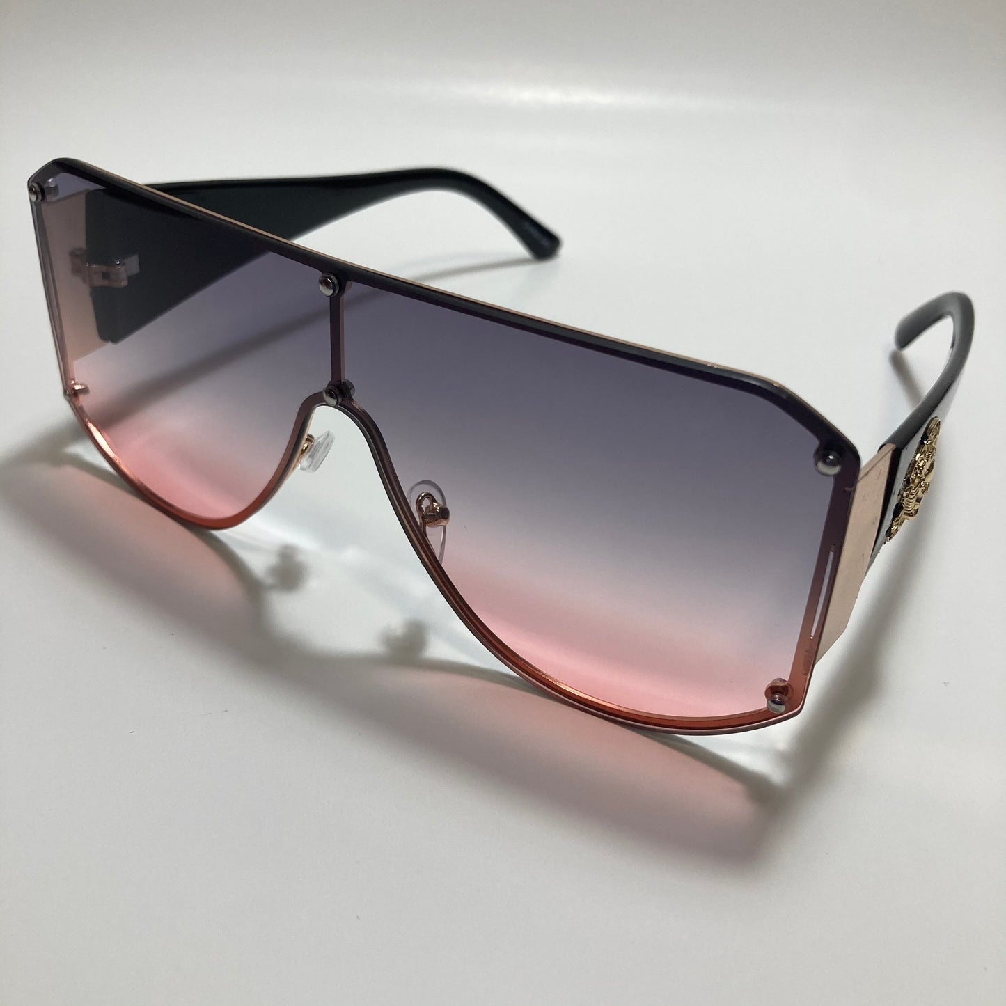 purple pink and gold shield sunglasses