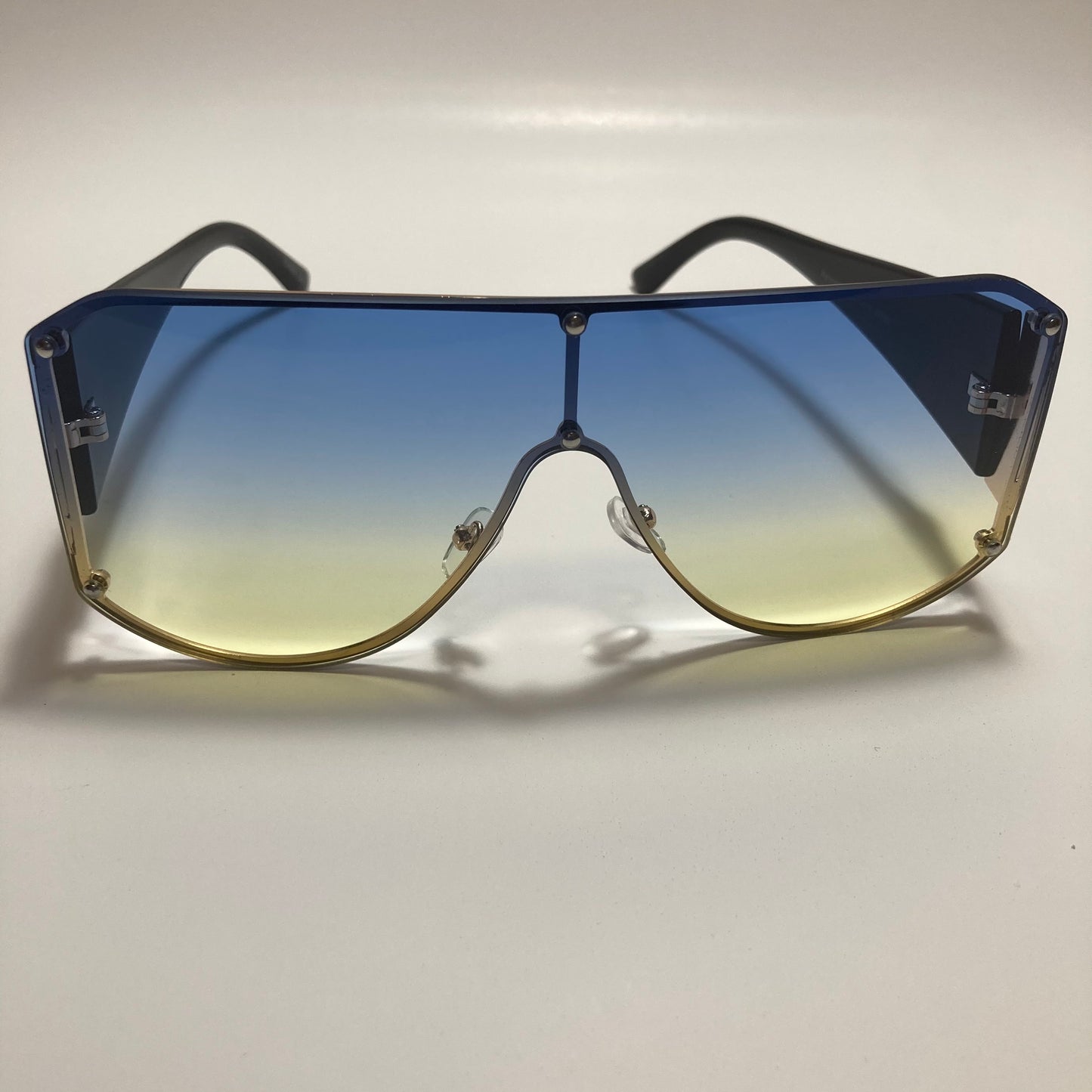 black yellow and blue shield sunglasses