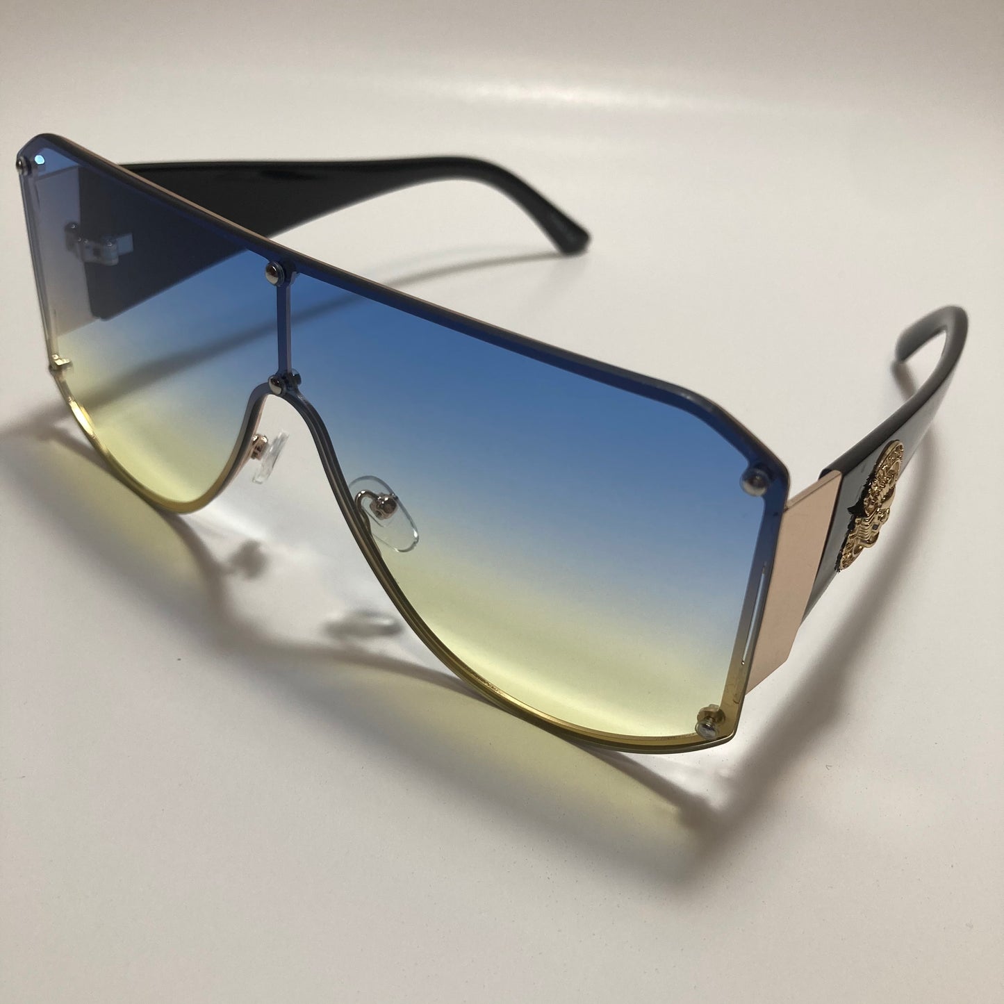 black yellow and blue shield sunglasses