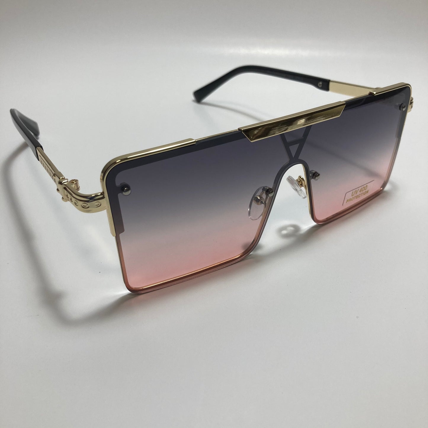 womens gold square oversize sunglasses with pink and black lenses