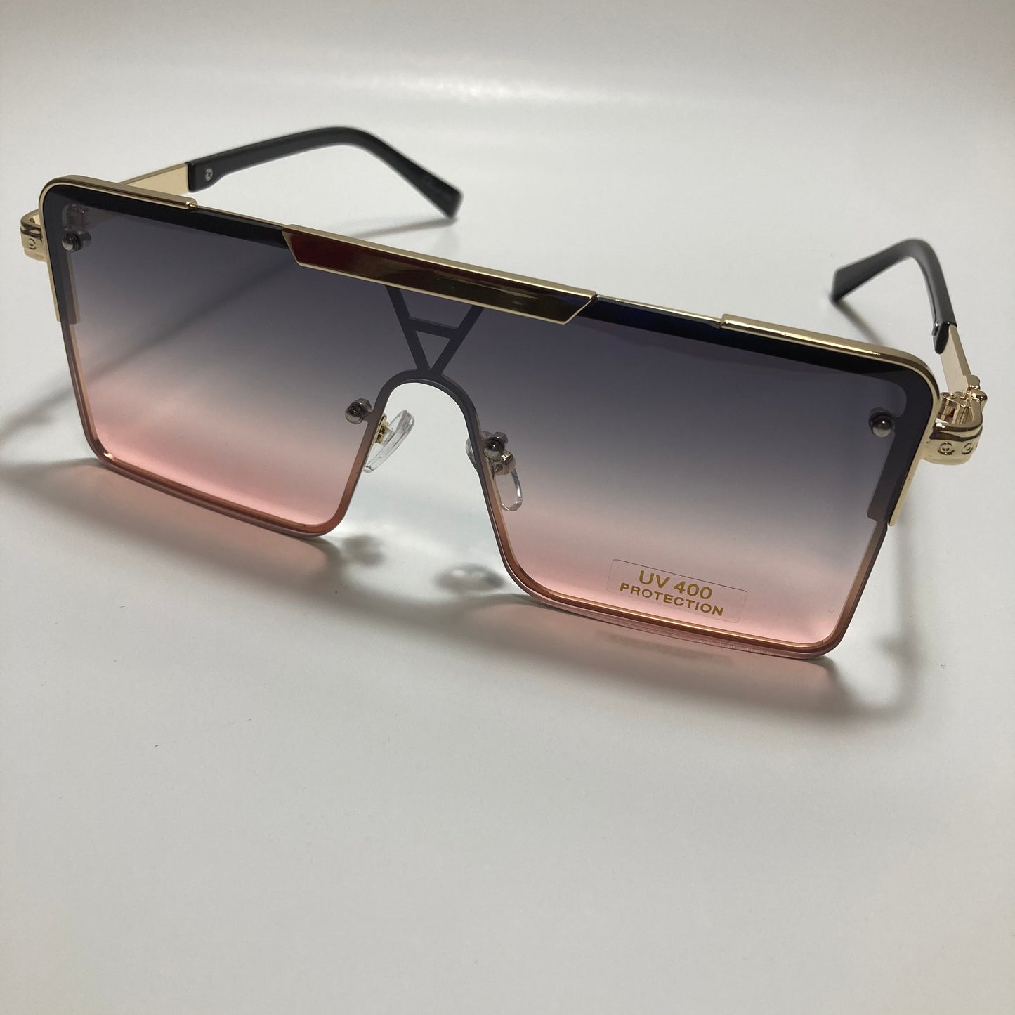 womens gold square oversize sunglasses with pink and black lenses