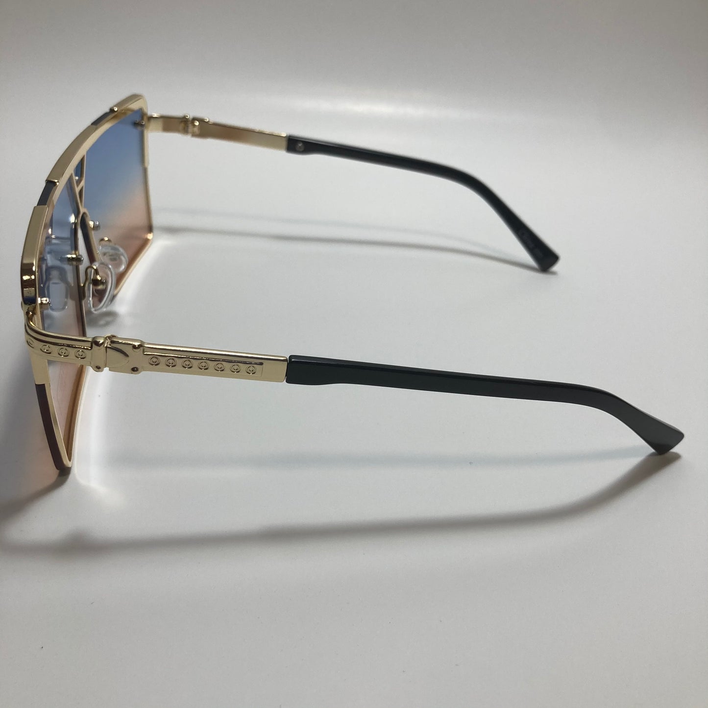 womens gold square oversize sunglasses with pink and blue lenses