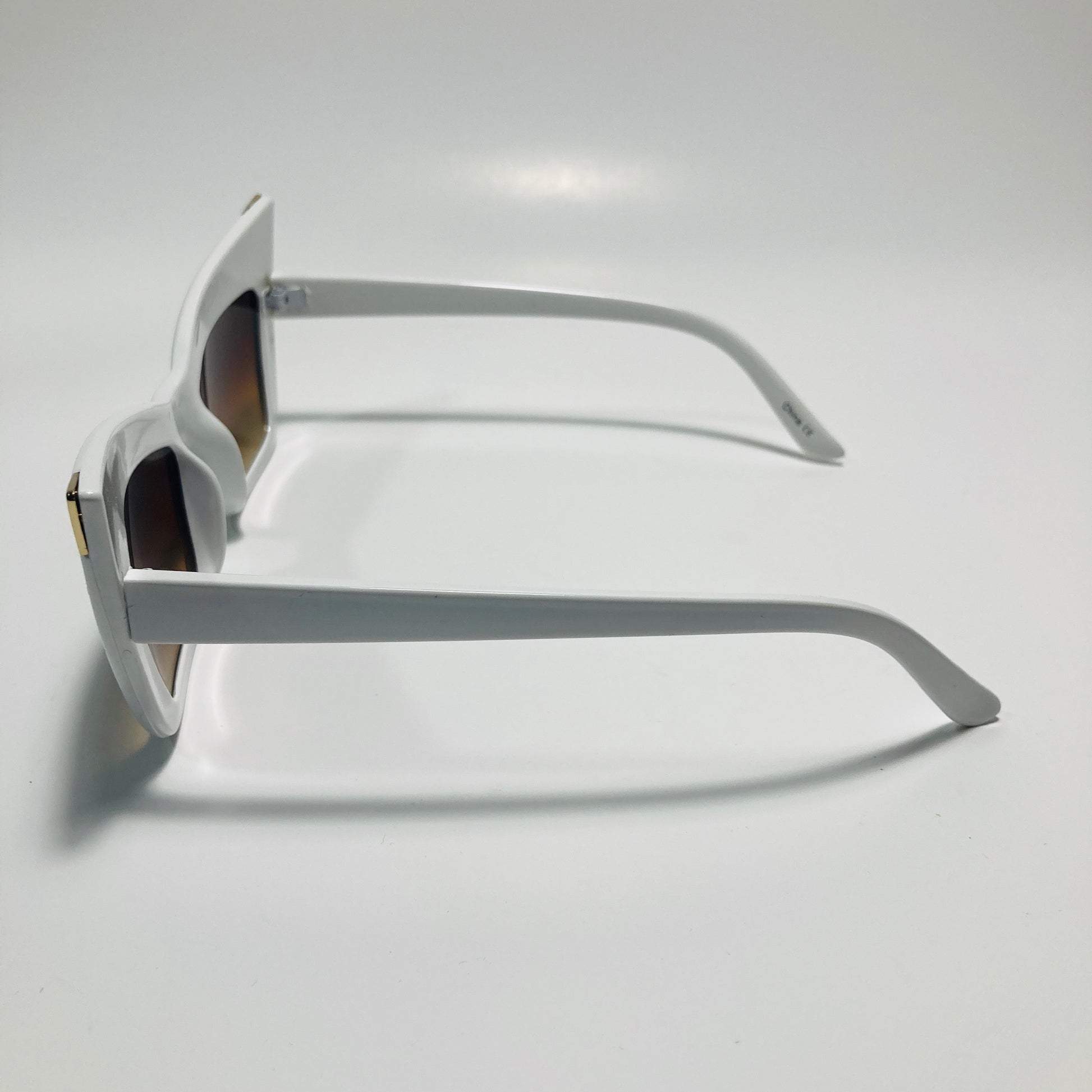 white and brown goth sunglasses