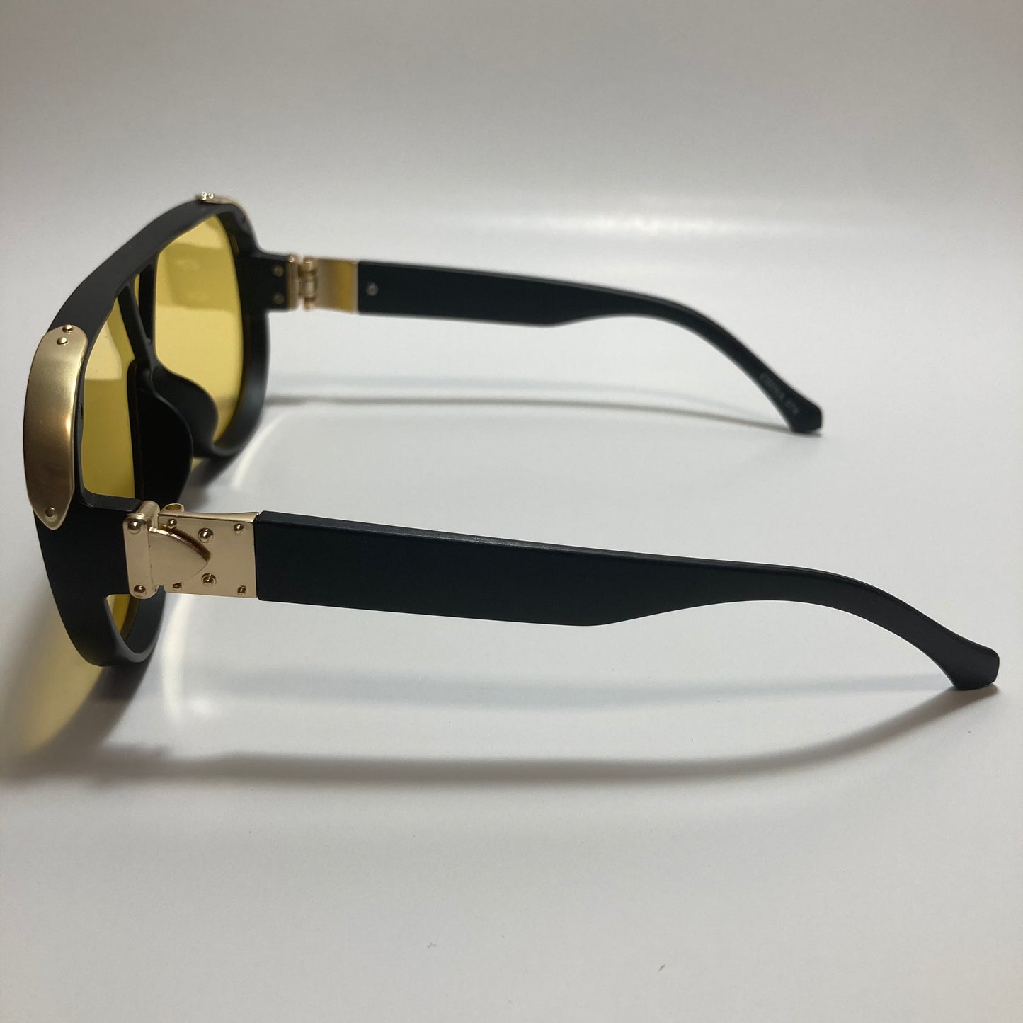 mens and womens black and yellow aviator sunglasses