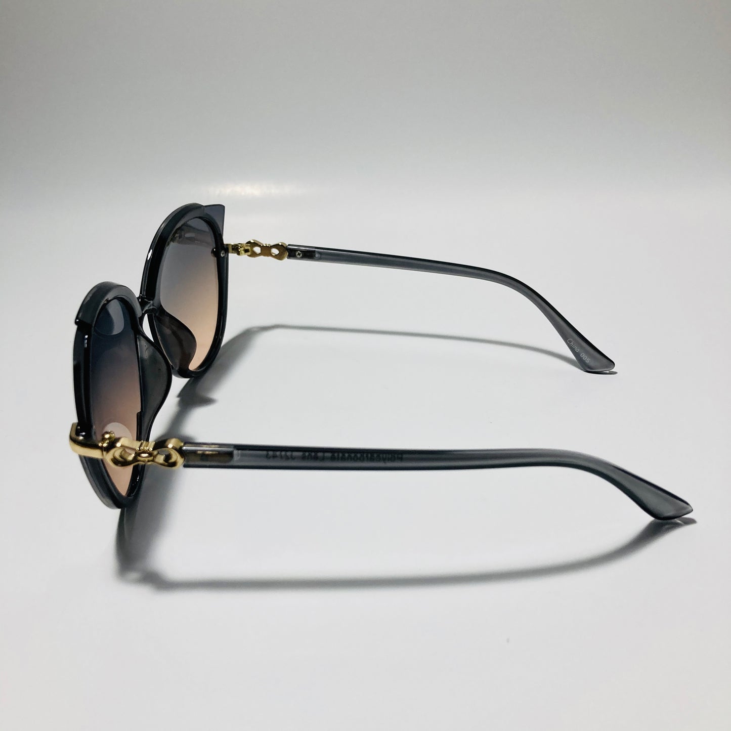 Womens black and pink cat eye sunglasses