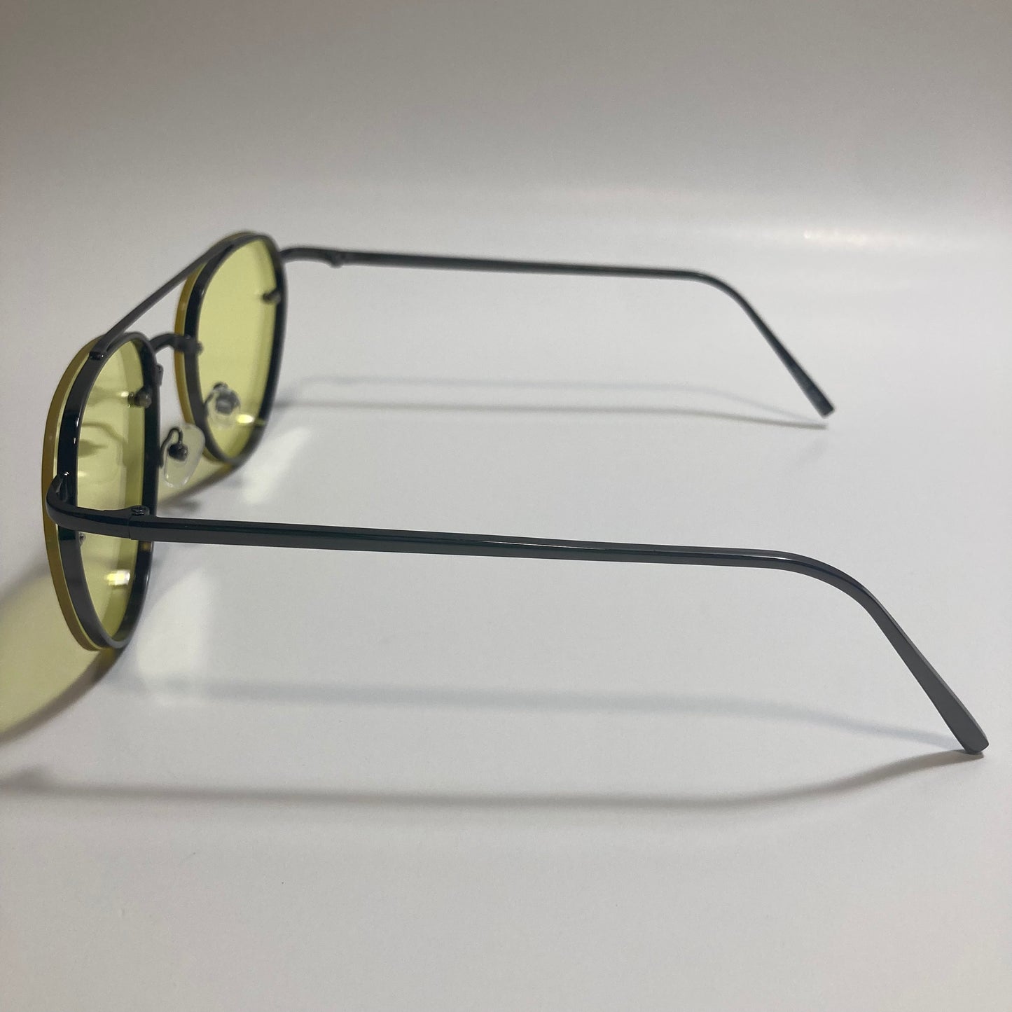 Womens and Mens Black Aviator sunglasses with yellow lenses