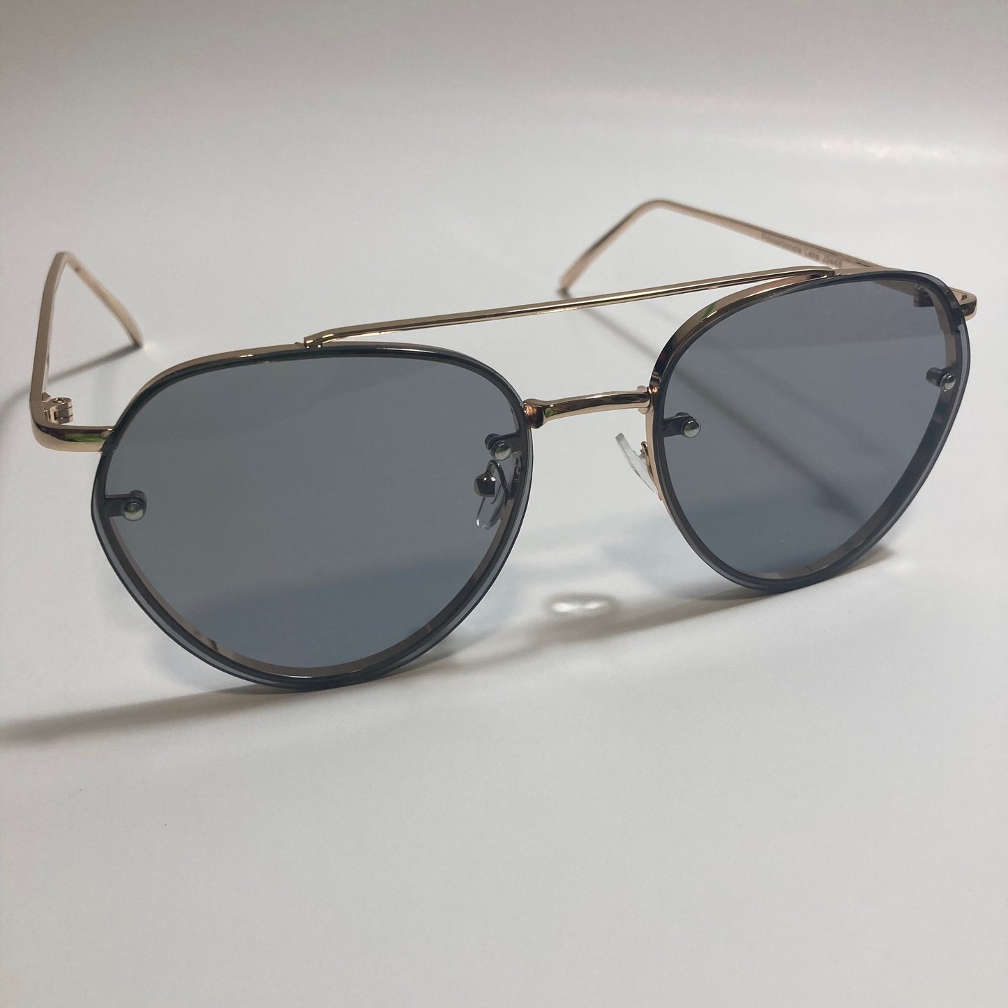 Womens and Mens gold Aviator sunglasses with black lenses