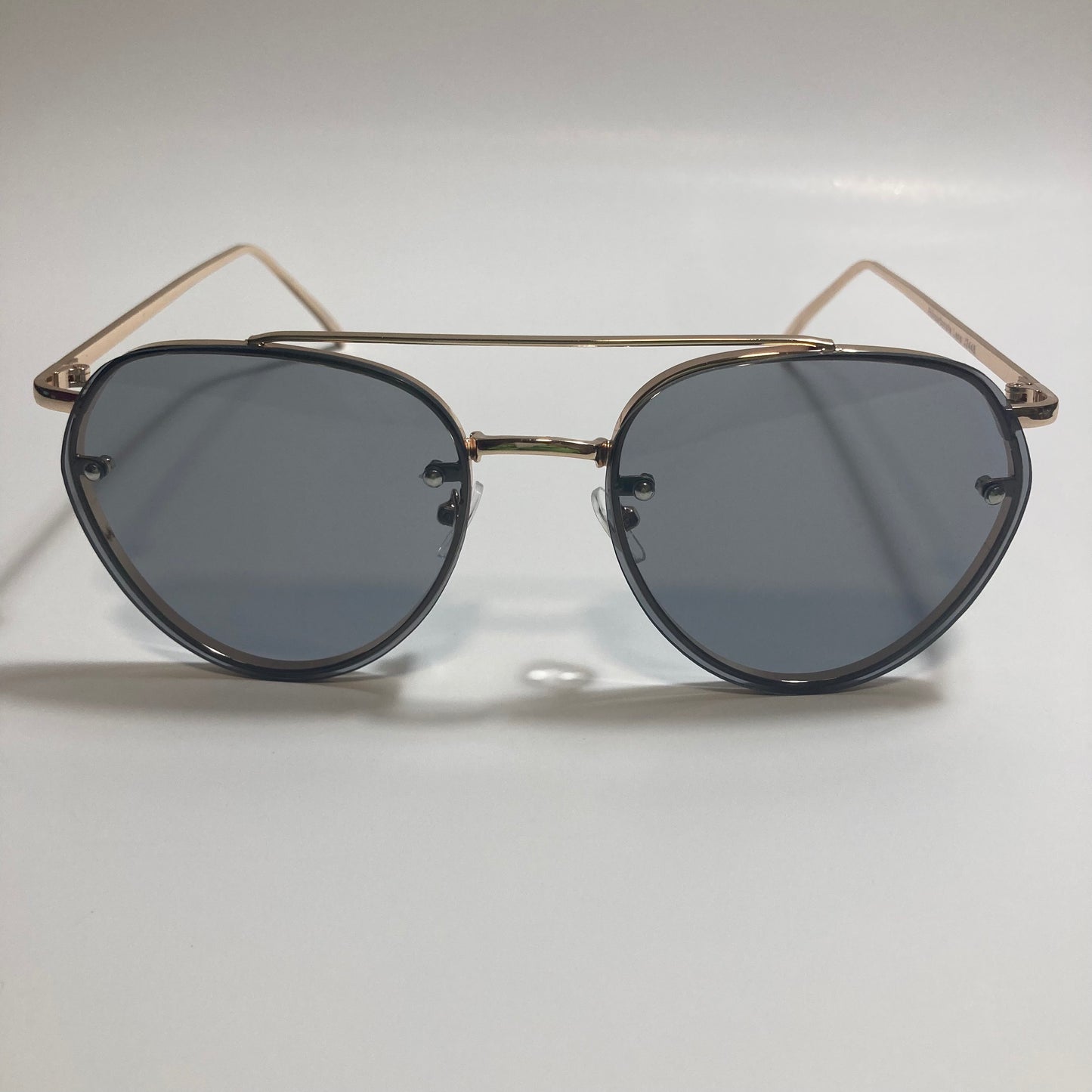 Womens and Mens gold Aviator sunglasses with black lenses