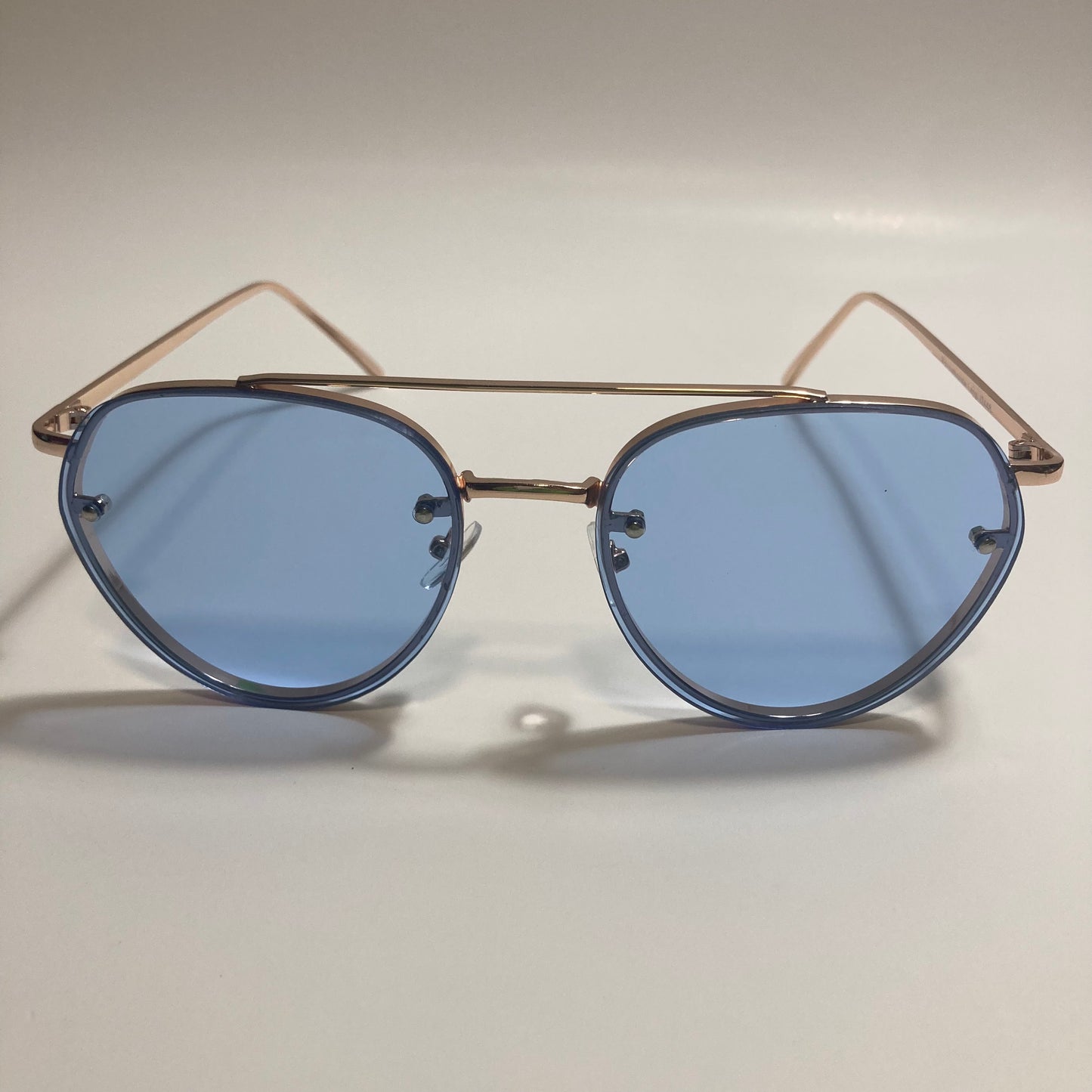 Womens and Mens gold Aviator sunglasses with blue lenses