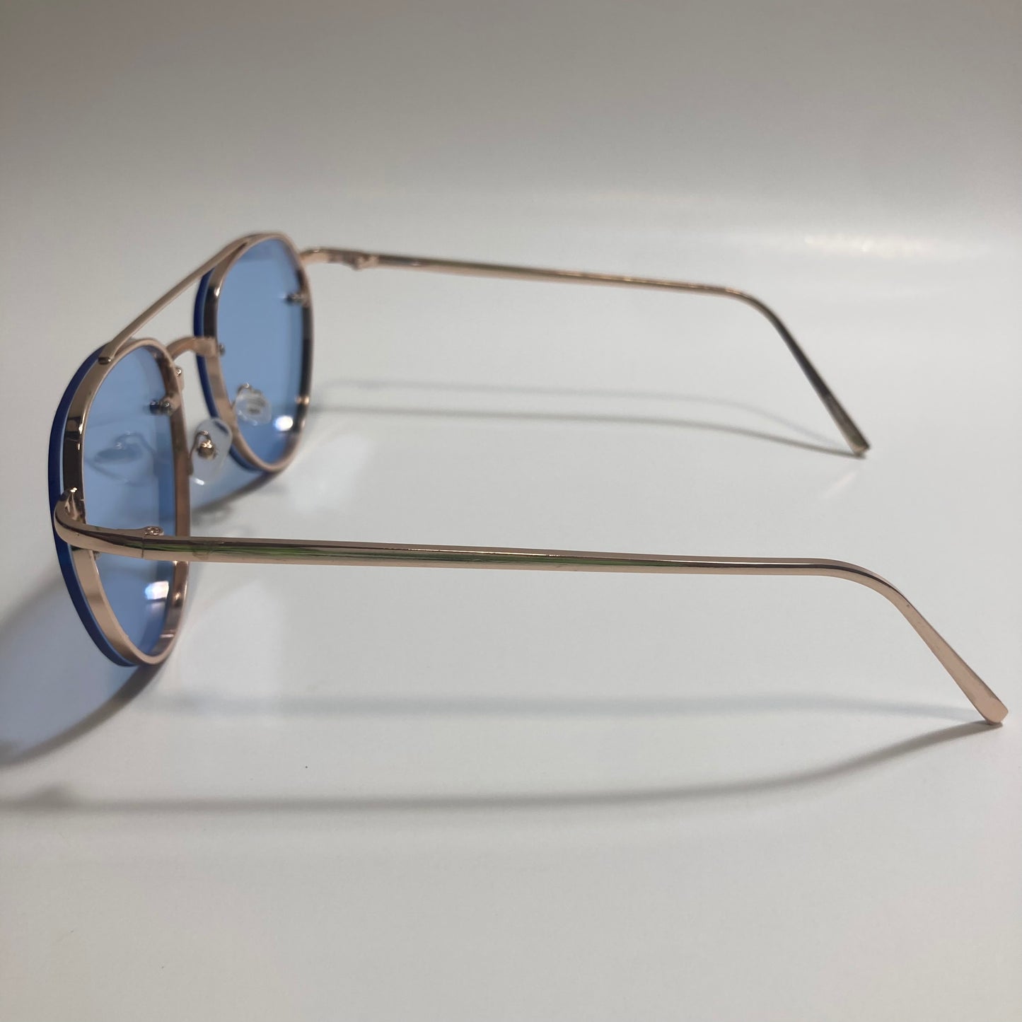 Womens and Mens gold Aviator sunglasses with blue lenses