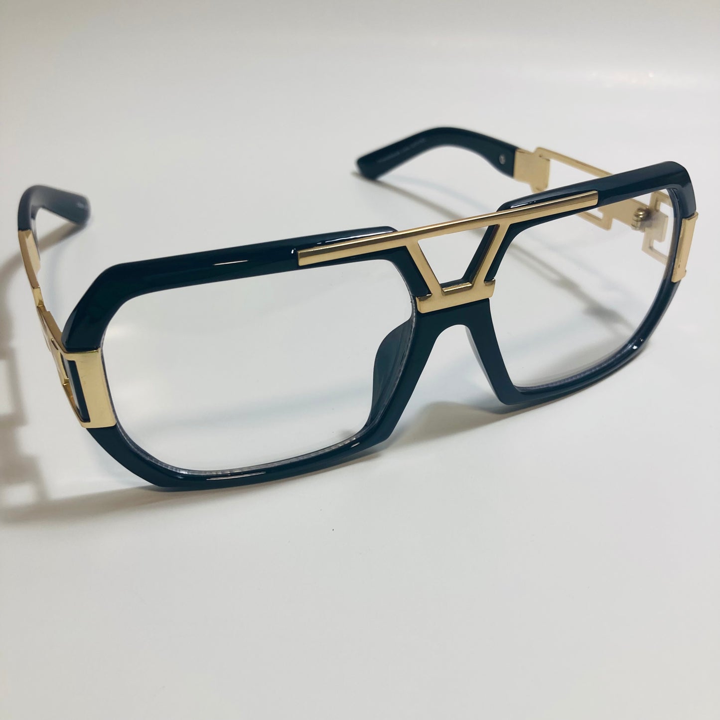mens and womens black and gold gazelle glasses
