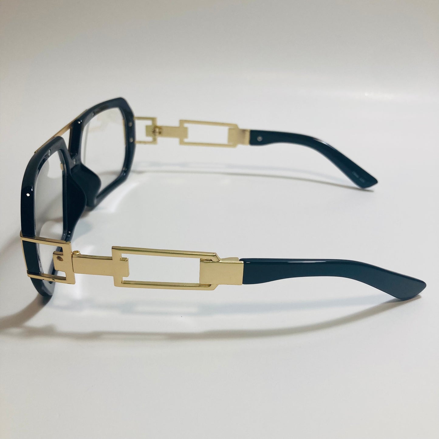 mens and womens black and gold gazelle glasses