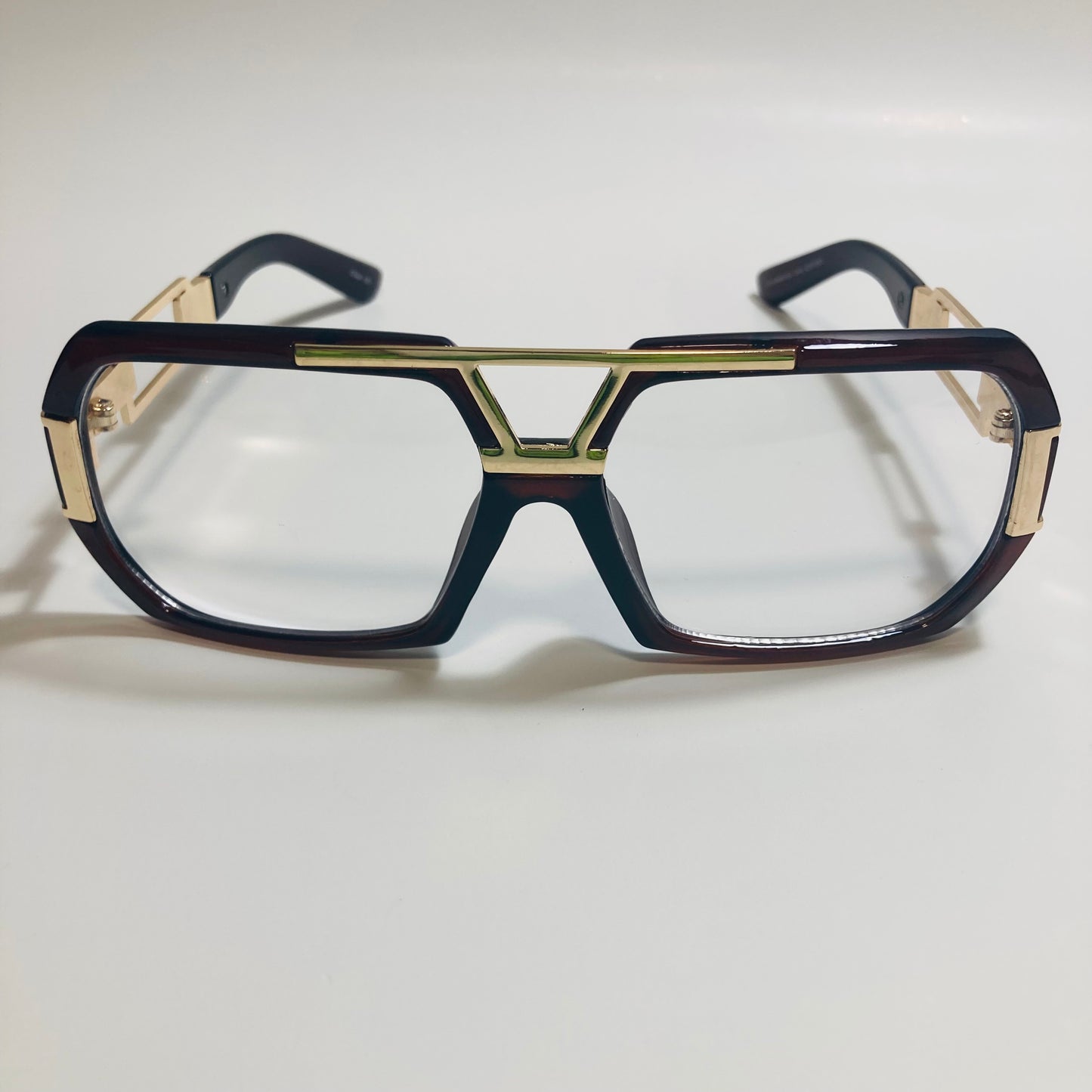 mens and womens brown and gold gazelle glasses