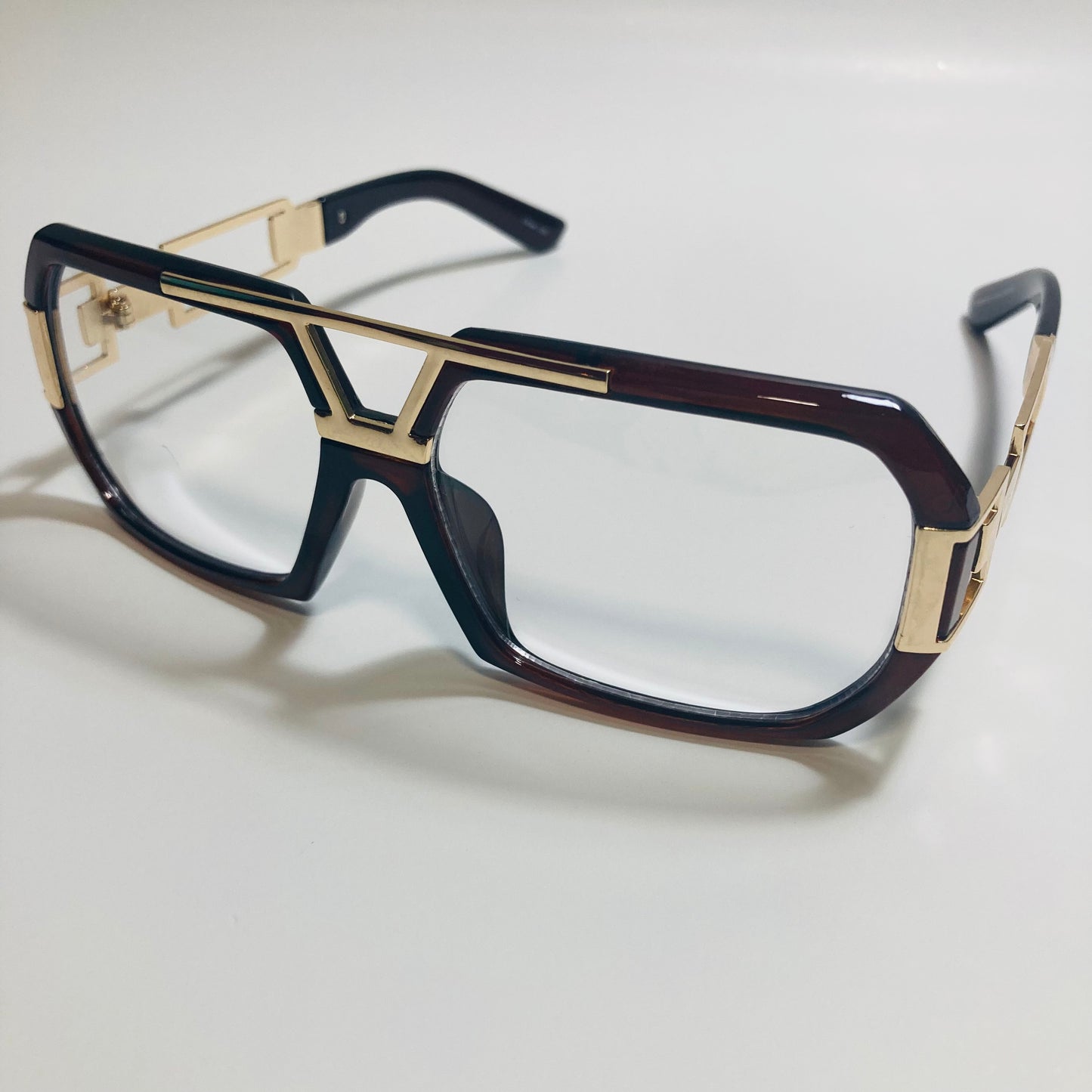 mens and womens brown and gold gazelle glasses