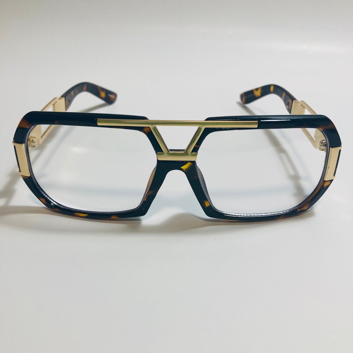 mens and womens brown and gold gazelle glasses