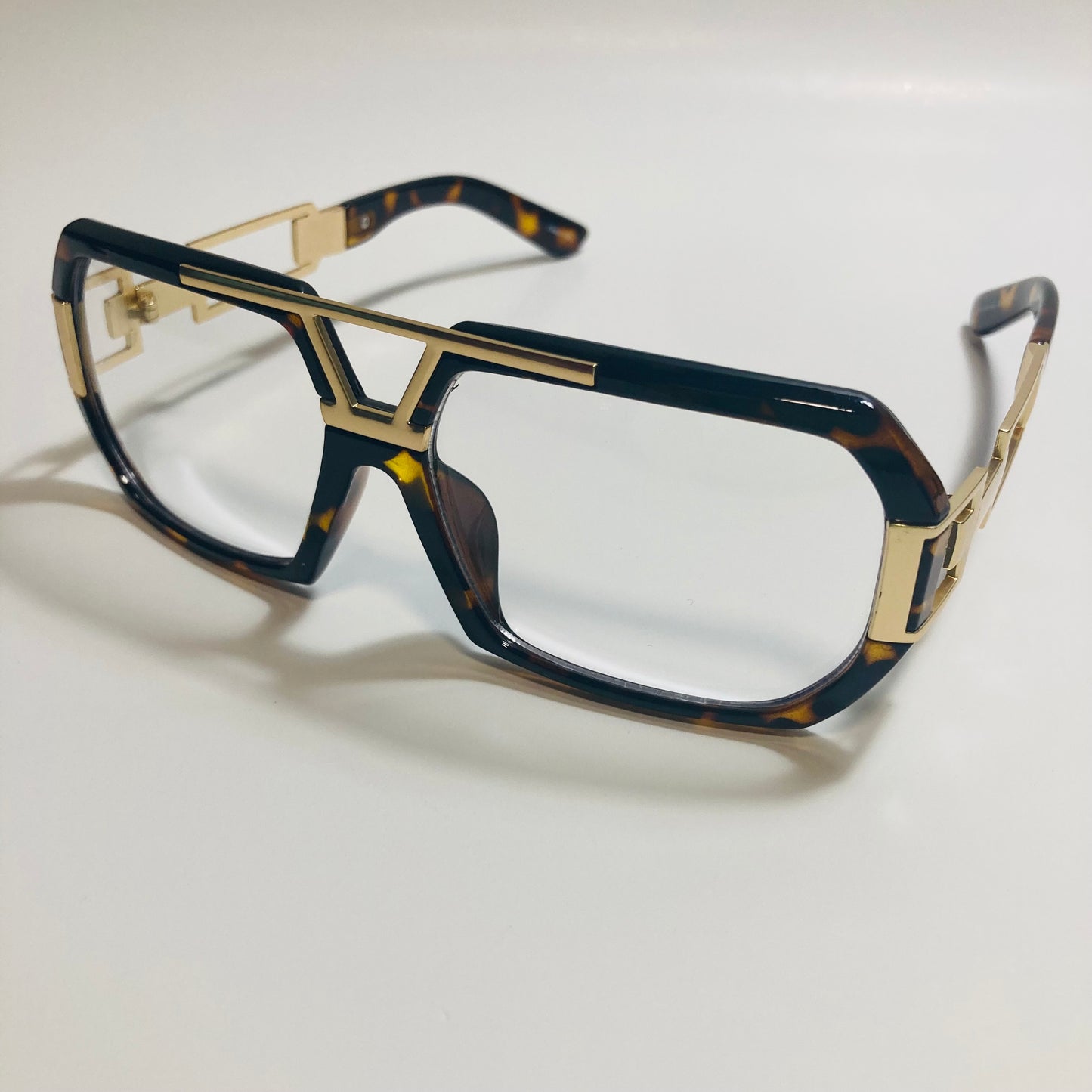 mens and womens brown and gold gazelle glasses