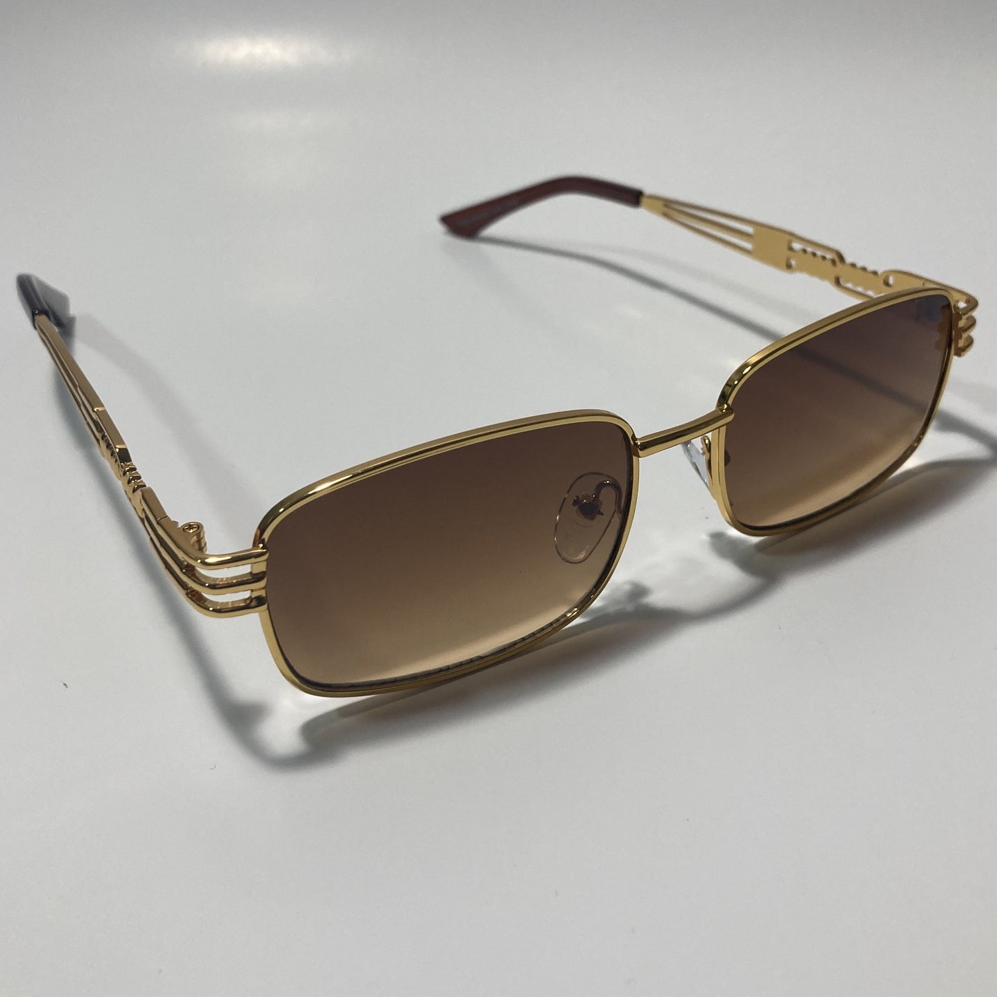 mens and womens gold square sunglasses with brown lenses