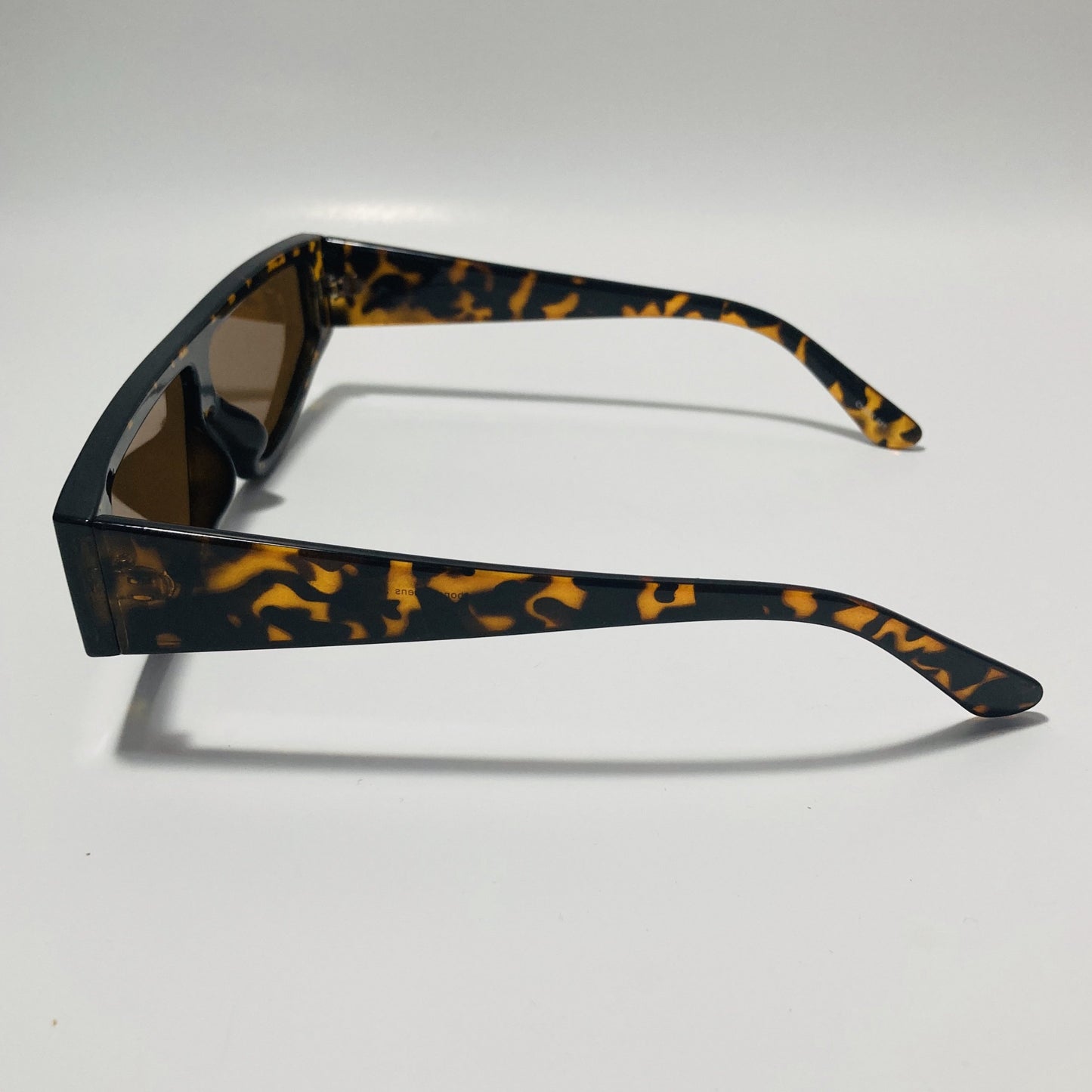 mens and womens brown futuristic sunglasses with brown lenses