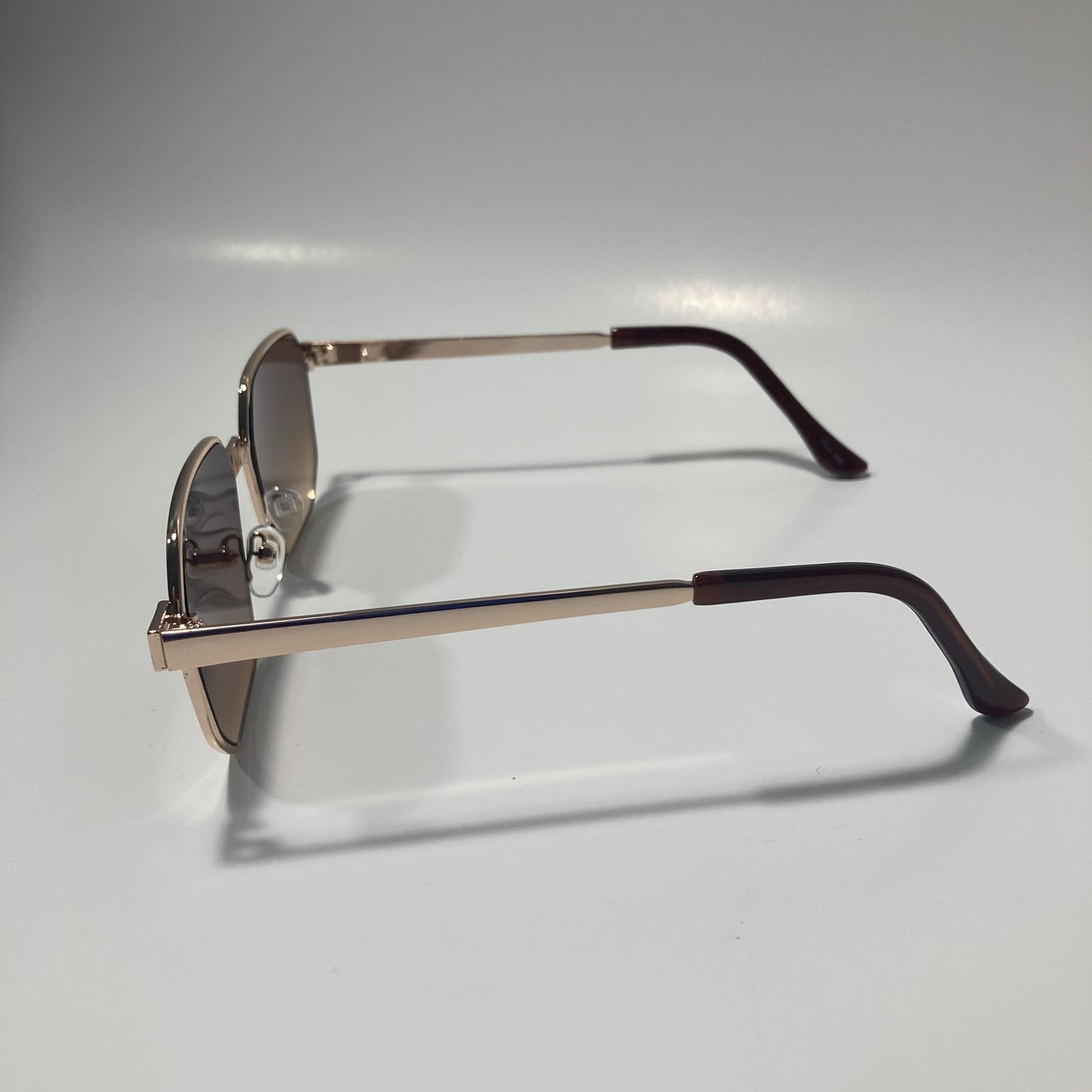 mens and womens brown and gold square sunglasses