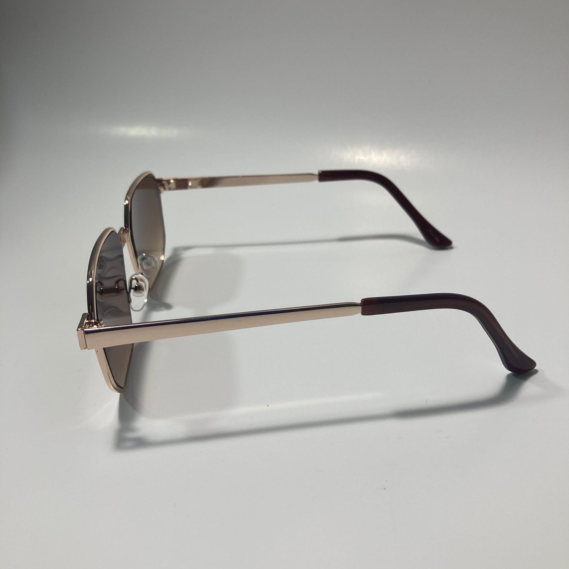 mens and womens brown and gold square sunglasses